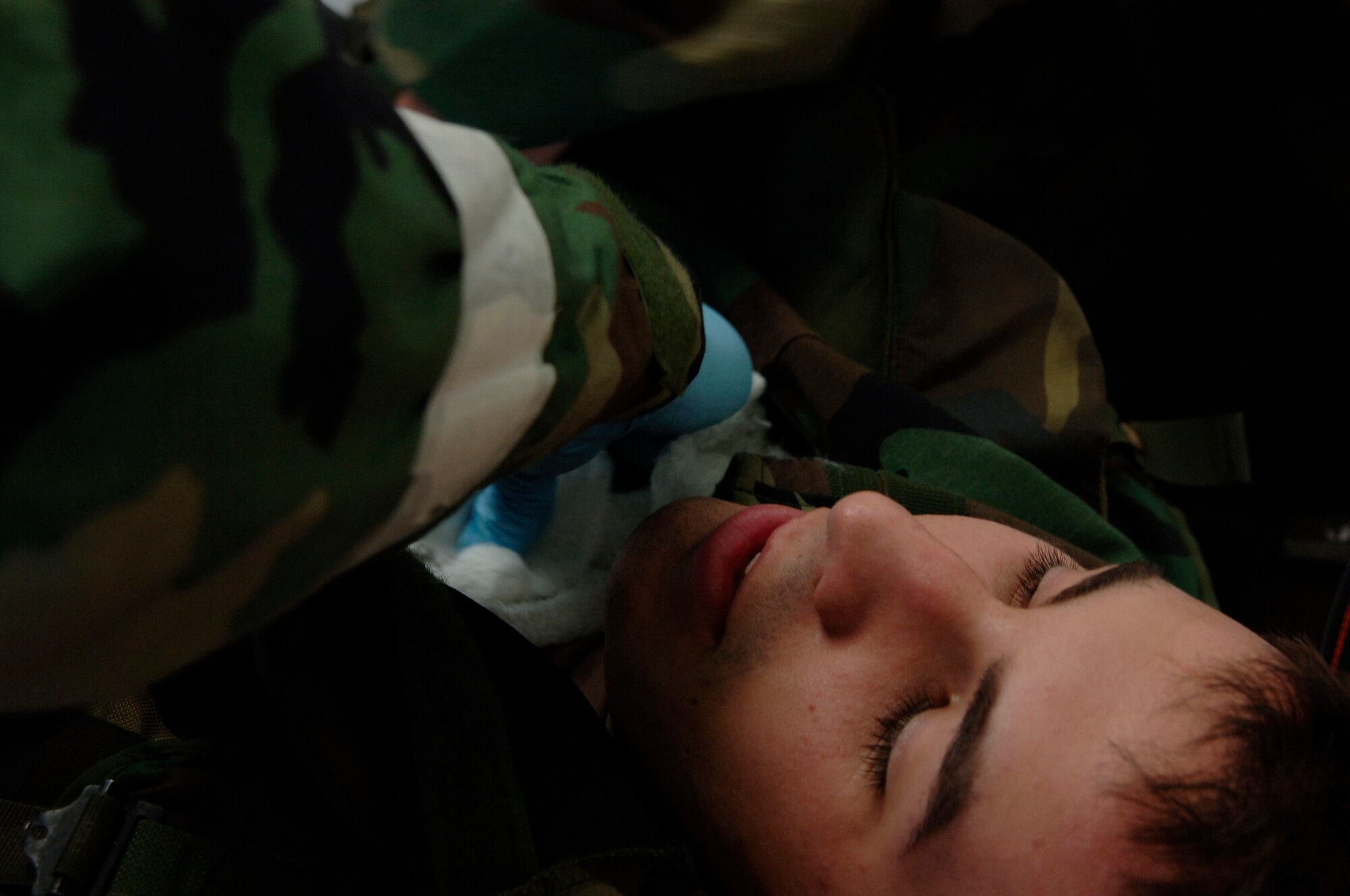 VOLK FIELD AIR NATIONAL GUARD BASE, Wis. -- Airman 1st Class Jonathan Gomez, 804th Medical Group, participates in a medical demonstration at Volk Field, Wis., June 27. Medics keep current in their job by training and practicing as if a situation were real. (photo by Senior Airman Laura Suttles)