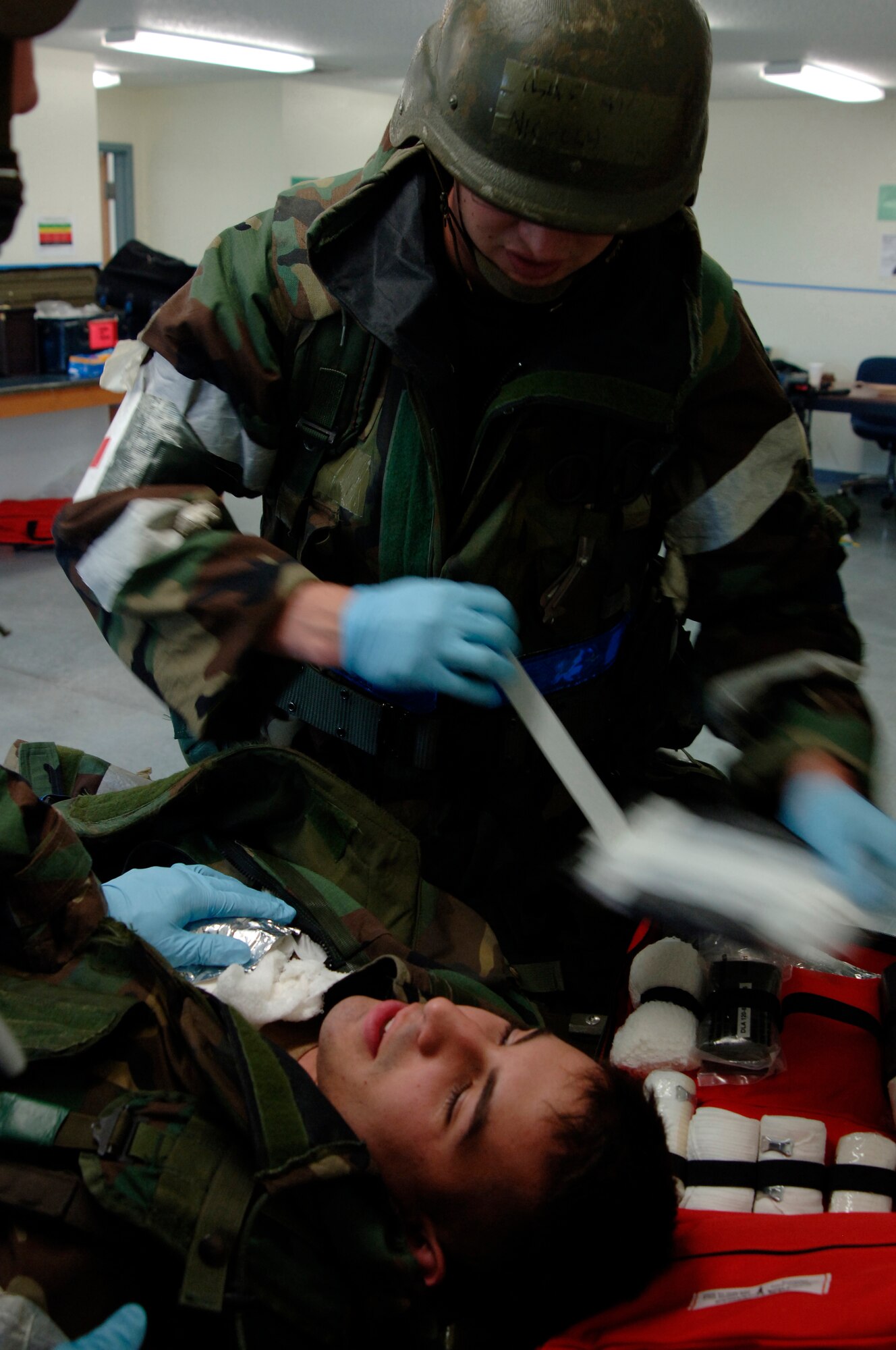 VOLK FIELD AIR NATIONAL GUARD BASE, Wis. -- Senior Airman Jonathan Gomez, 804th Medical Group, acts as a test dummy for the medical crew at Volk Field, Wis., June 27. The medical crew tests their ability to operate in wartime conditions. (photo by Senior Airman Laura Suttles)