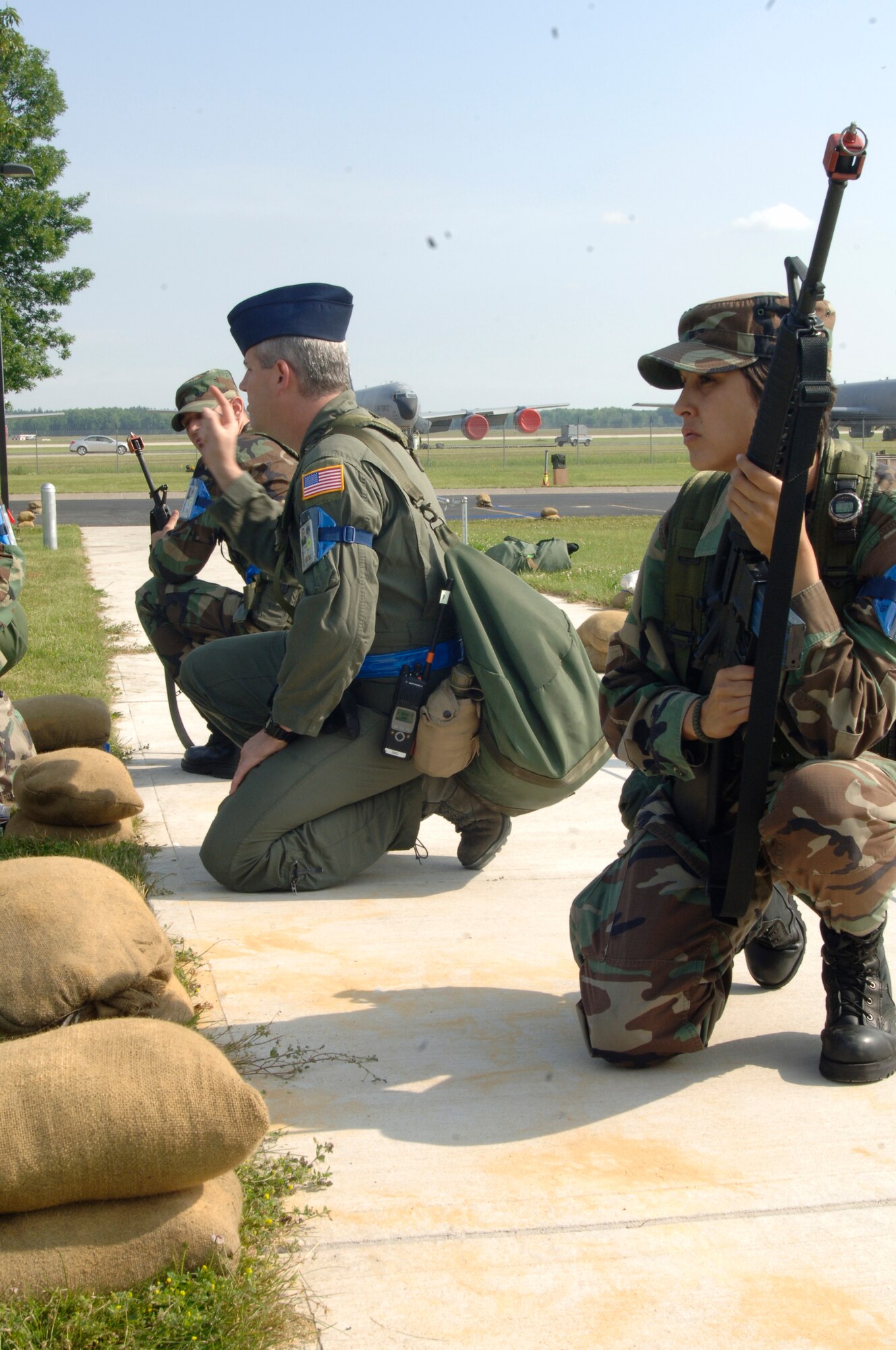 VOLK FIELD AIR NATIONAL GUARD BASE, Wis. -- Senior Airman Christina Smith, 804th Operational Support Squadron, posts guard for team Nagoya members at Volk Field, Wis., June 25. Many members of Team Nagoya were called upon to pull shifts, watching over their fellow wingman for an exercise. (photo by Senior Airman Laura Suttles)