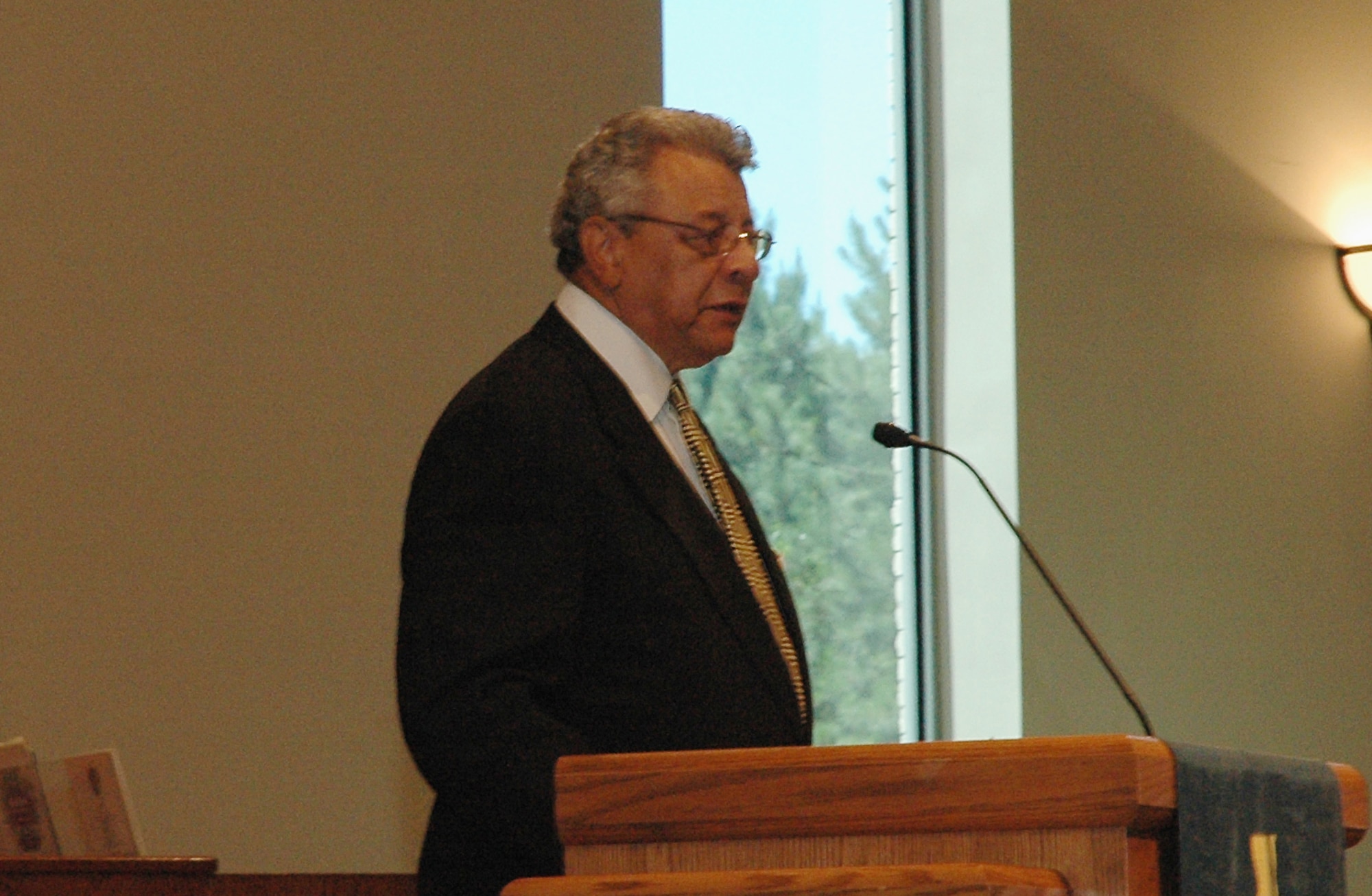 7/1/2008 - "Chuck Dryden was the kind of person you could sit on the porch and enjoy a drink with, without you ever saying a word. You would walk away saying that's the best conversation I ever had," said former Assistant Secretary of the Air Force Rodney Coleman.  Mr. Coleman gave tribute to the late retired Air Force Lt. Col. Charles Dryden, a World War II Tuskegee Airman fighter pilot, during his funeral service in Atlanta.  (U.S. Air Force photo/Master Sgt. Stan Coleman) 