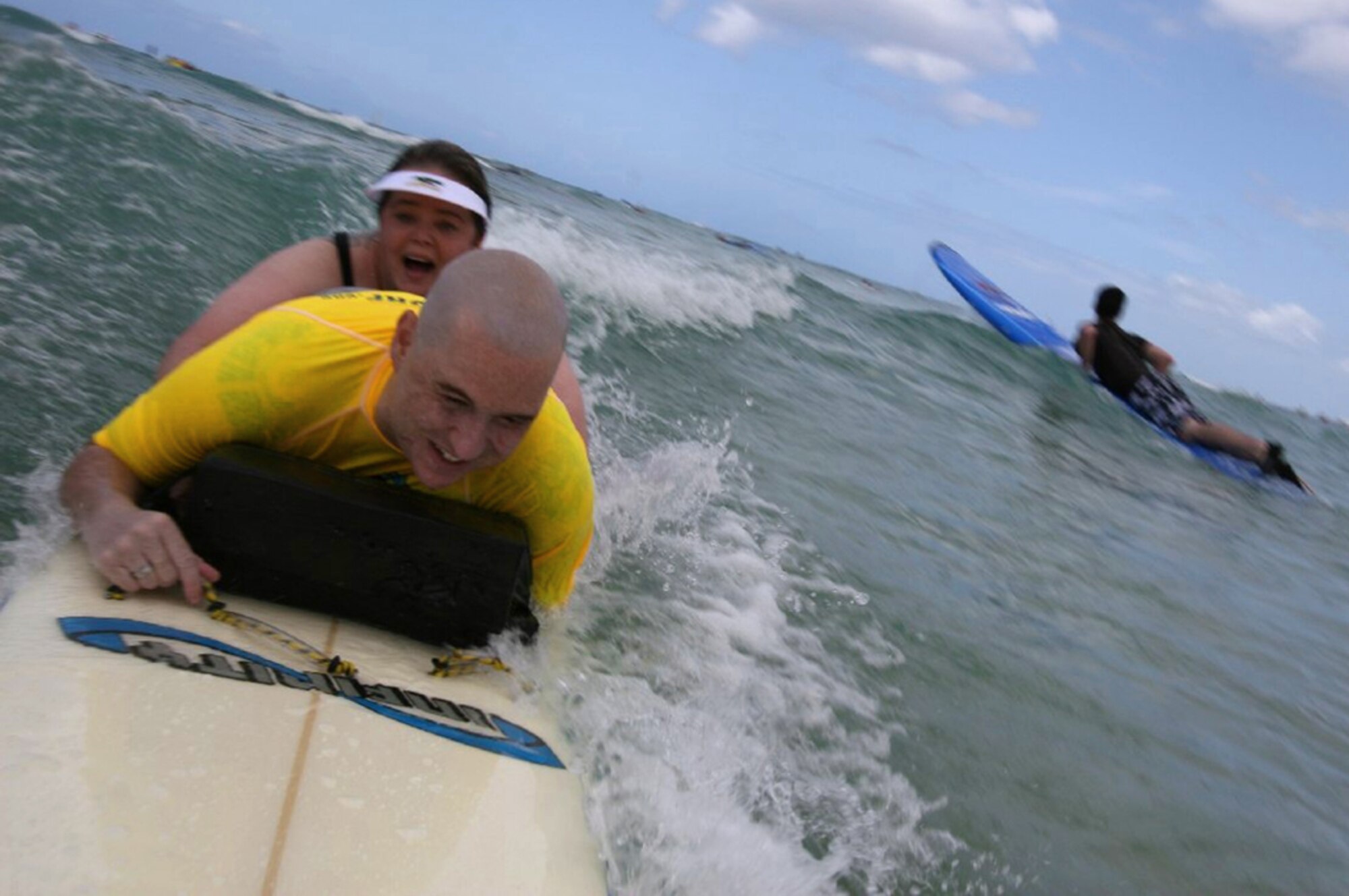 Catching a wave or two, Matt and Annette enjoy a second honeymoon in Hawaii following the renewal of their marriage vows. (courtesy photo)