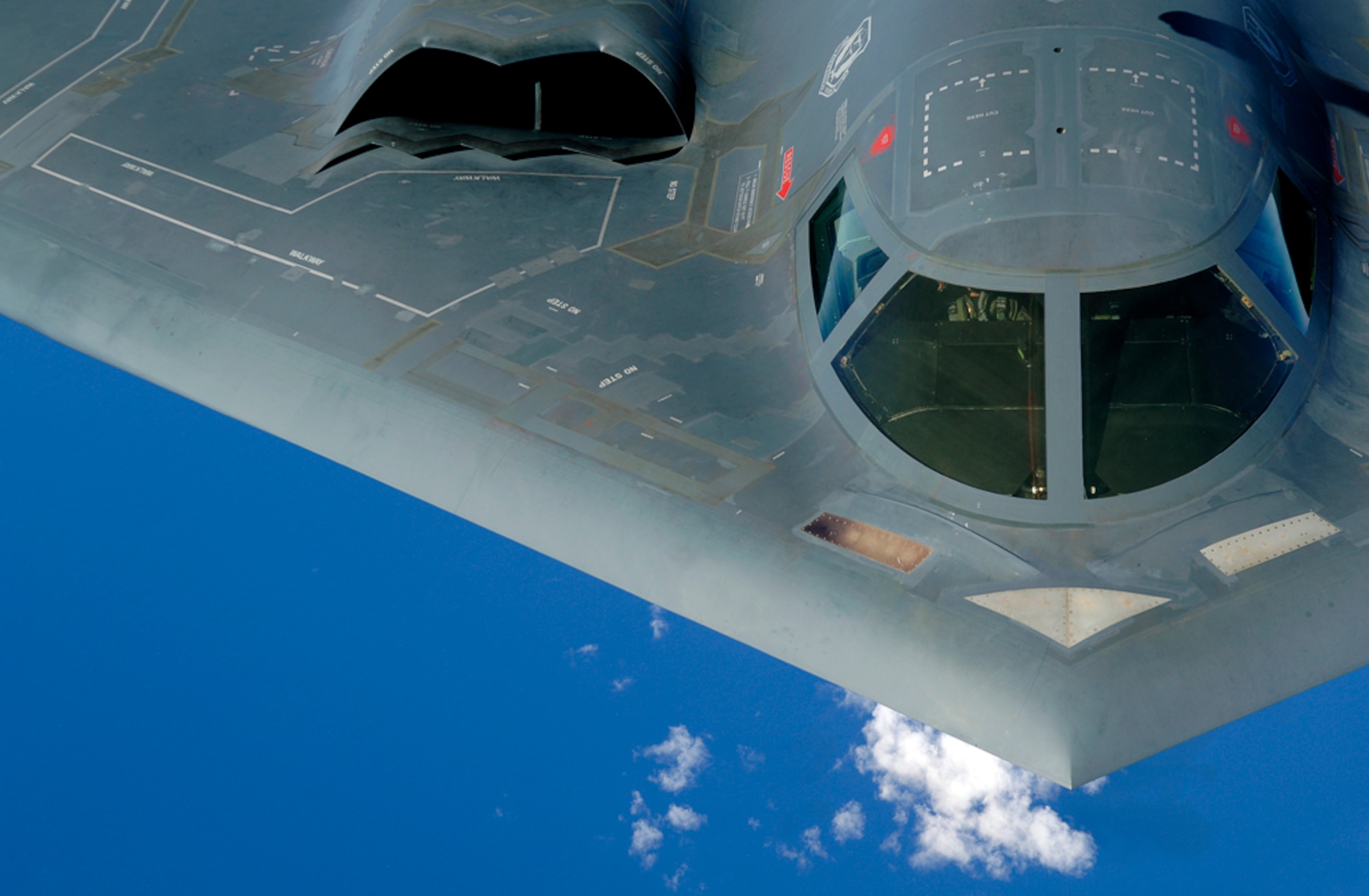 A B-2 Spirit soars after a refueling mission over the Pacific Ocean. The bomber aircraft, from the 509th Bomb Wing at Whiteman AFB, Mo., is part of a continuous bomber presence in the Asia-Pacific region. (U.S. Air Force photo by Staff Sgt. Bennie J. Davis III) 