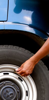For a safe trip in a 15-passenger van, you should check your tire pressure at least once a month. (photo by Tech. Sgt. Matthew Hannen)