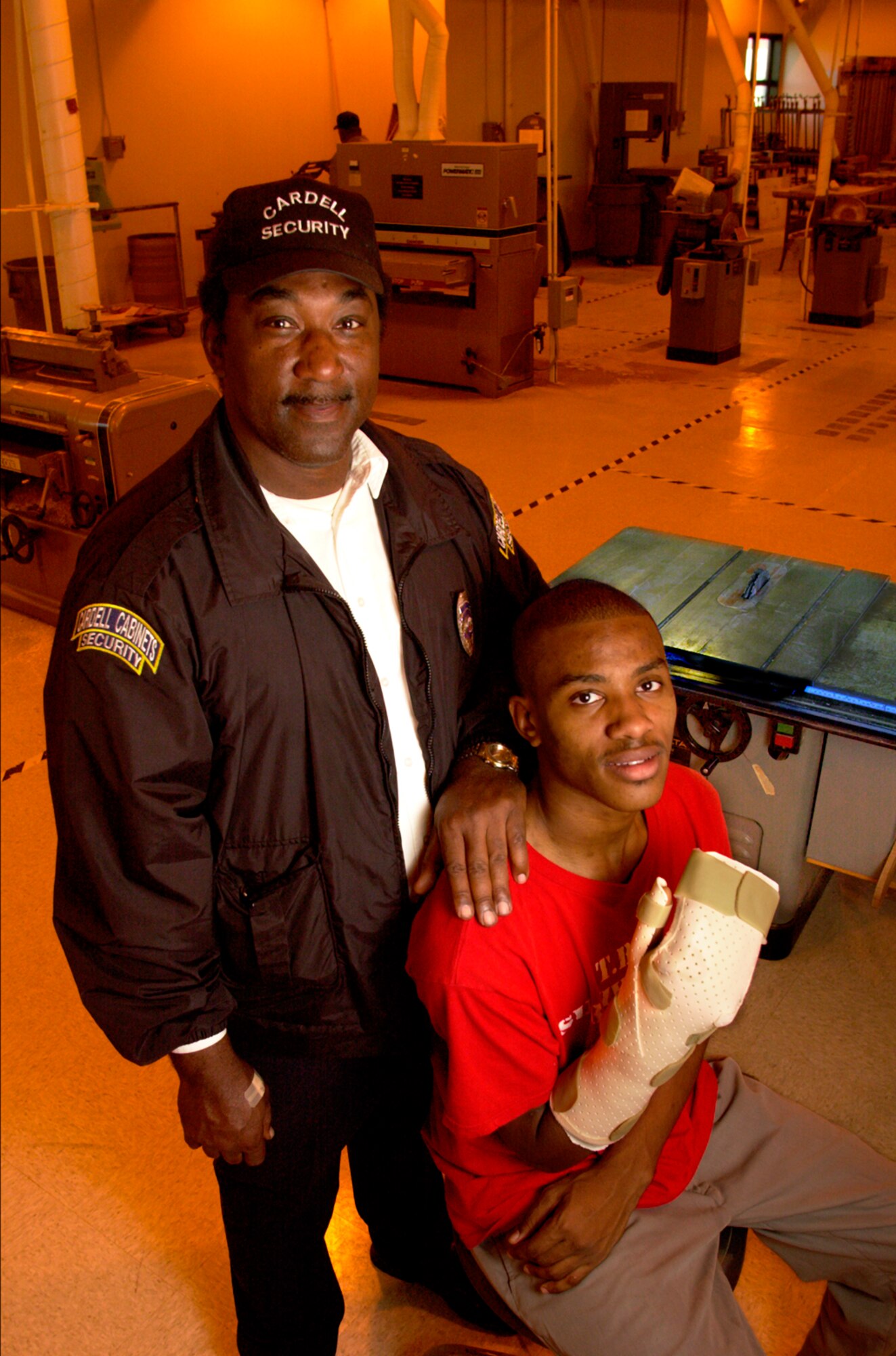 Shortly after the accident, Fred Lee Sr. choked back fear as he saw his son's blood-soaked shirt and a bandage crudely securing Fred Junior's severed hand to his wrist. (photo by Steve Thurow)