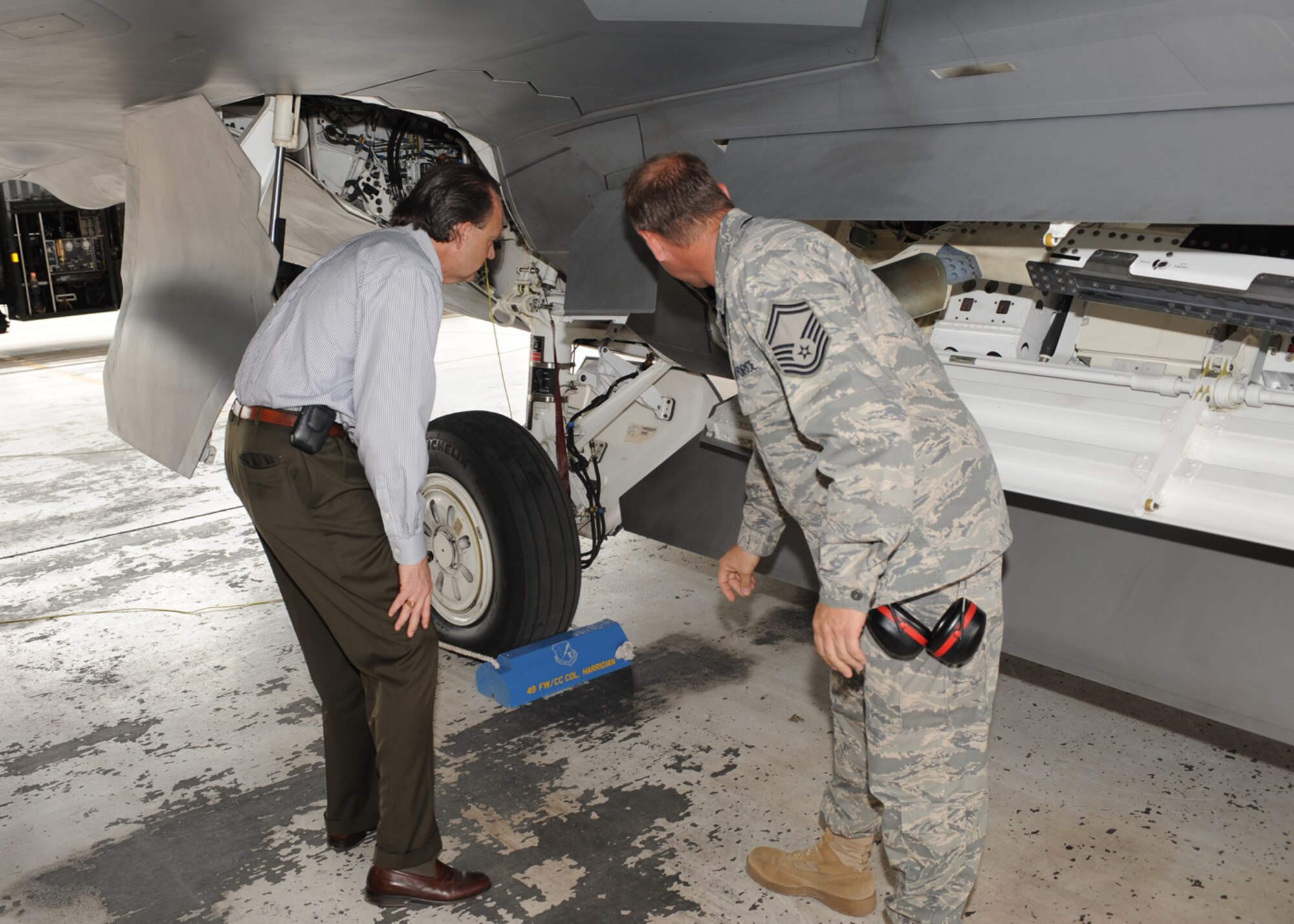 Assistant Secretary of the Air Force Mr. Bill Anderson visits the flight line located on Holloman Air Force Base, N.M.,  Wednesday, June 25. Mr. Anderson was getting a description and tour of the F-22. (U.S Air Force photo/ Airman 1st Class DeAndre Curtiss)