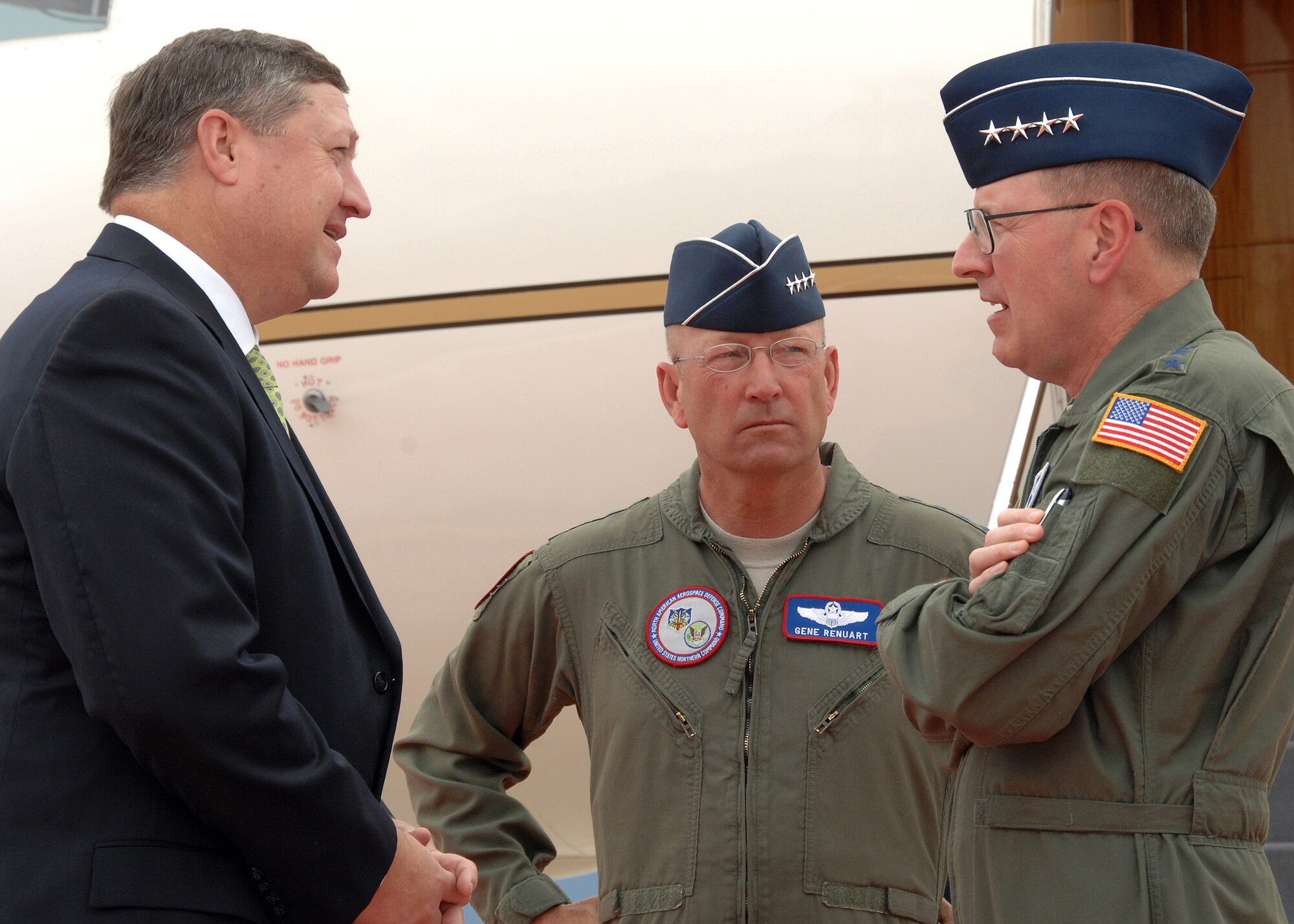 PETERSON AIR FORCE BASE, Colo., -- Acting Secretary of the Air Force Michael B. Donley (left) is greeted by Gen. C. Robert Kehler, commander of Air Force Space Command (right) and Gen. Gene Renuart, commander of U.S. Northern Command and the North American Aerospace Defense Command upon his arrival at Peterson Air Force Base, Colo. Mr. Donley visited four bases on July 1-2 to discuss his perspectives and address the issues facing the Air Force. (U. S. Air Force photo by Duncan Wood)