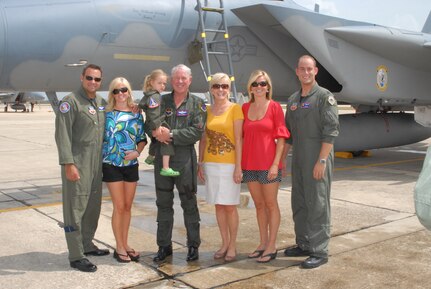 Gen. William R. Looney, Commander, Air Education and Training Command, was honored by fellow Airmen, friends and family during his final, or "fini," flight July 1. General Looney selected an F-15 aircraft as his last flight and was honored by firefighters dousing him with hundreds of gallons of water and friends and family showering him with warm wishes for his retirement. (U.S. Air Force photo by Rich McFadden)