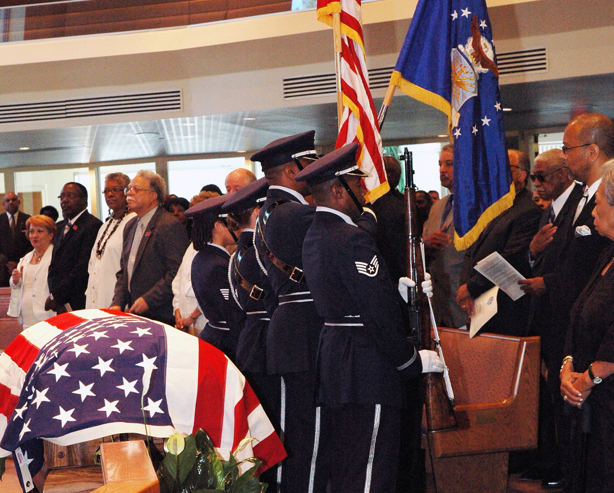 7/1/08--The Dobbins Air Reserve Base Honor Guard perform the presentation of colors during the funeral service of retired Air Force Lt. Col. Charles Dryden.  Colonel Dryden was a fighter pilot  with the Tuskegee Airmen during World War II. (U.S. Air Force photo/Master Sgt. Stan Coleman)