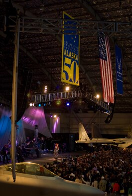 ELMENDORF AIR FORCE BASE, Alaska -- Wynonna Judd performs to the military and Alaska crowd at the "Alaska's Concert for the Military" concert June 27 at Hangar 2. The concert was the official kick off to the "We're In" weekend, celebrating Alaska's 50 years of statehood. More than 10,000 people attended the event. (U.S. Air Force photo/Airman 1st Class David Carbajal)