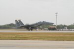 Gen. William R. Looney, Commander, Air Education and Training Command, was honored by fellow Airmen, friends and family during his final, or "fini," flight July 1. General Looney selected an F-15 aircraft as his last flight and was honored by firefighters dousing him with hundreds of gallons of water and friends and family showering him with warm wishes for his retirement. (U.S. Air Force photo by Rich McFadden)