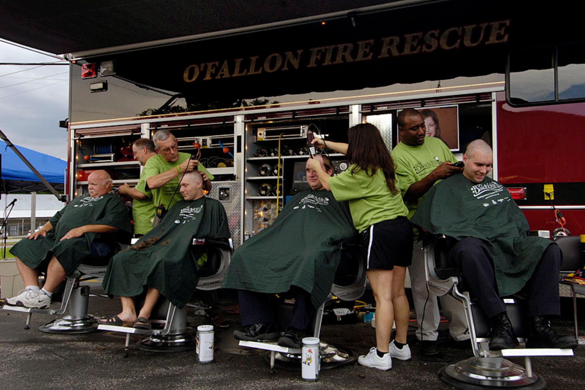 SCOTT AIR FORCE BASE, Ill. -- More than 40 volunteers from the O’Fallon Fire Department, local area and JTF Scott shaved their heads in support of cancer patients at the O’Fallon fire Department June 21.
(US Air Force photo/Senior Airman Jonathan Lovelady)