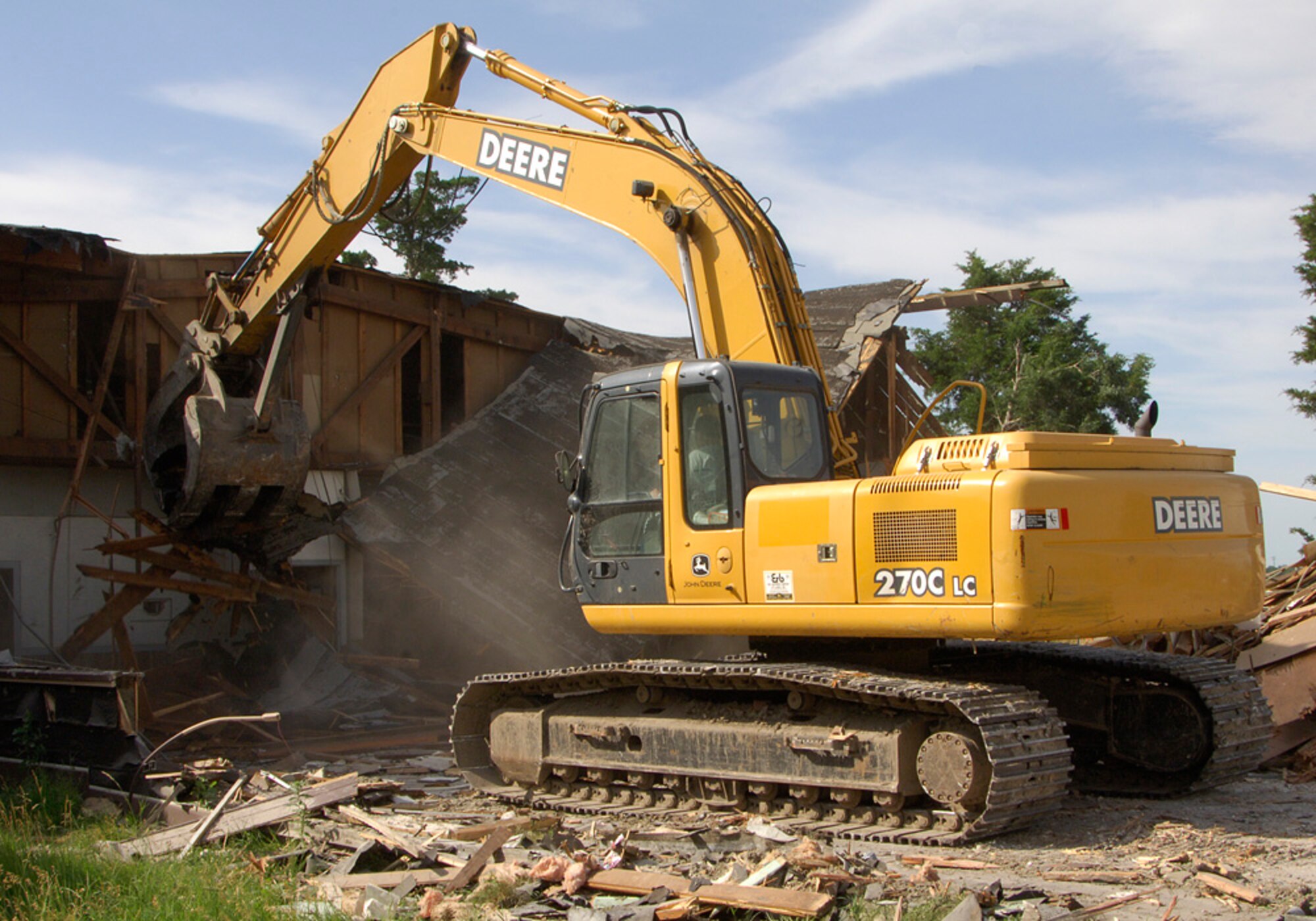 SCOTT AIR FORCE BASE, Ill. -- Gary Claxton of Lake Environmental Inc. works to tear down building 3190 in the warehouse district of Scott Air Force Base last week.(US Air Force photo/Airman 1st Class Wesley Farnsworth)
