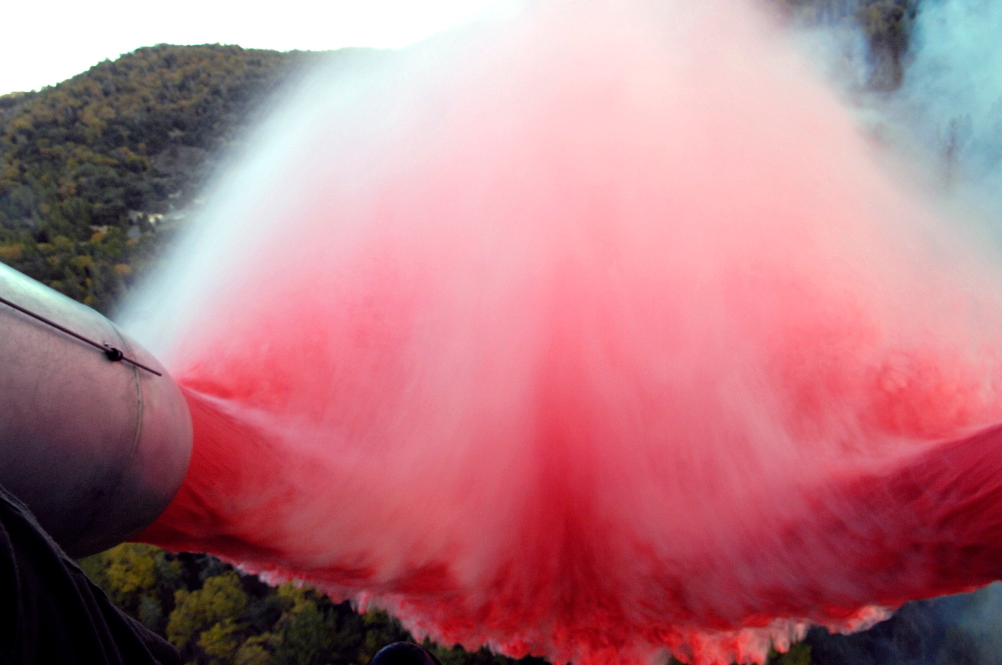 Airmen of the 302nd Air Expeditionary Group operating out of McClellan Airfield in Sacramento, Calif., and are flying C-130 Hercules aircraft that can drop 3,000 gallons of fire retardant supporting fighting fires in California. The Airmen are in their sixth day of fighting fires throughout the state. ((U.S. Air Force photo/Tech. Sgt. Roy. A. Santana)