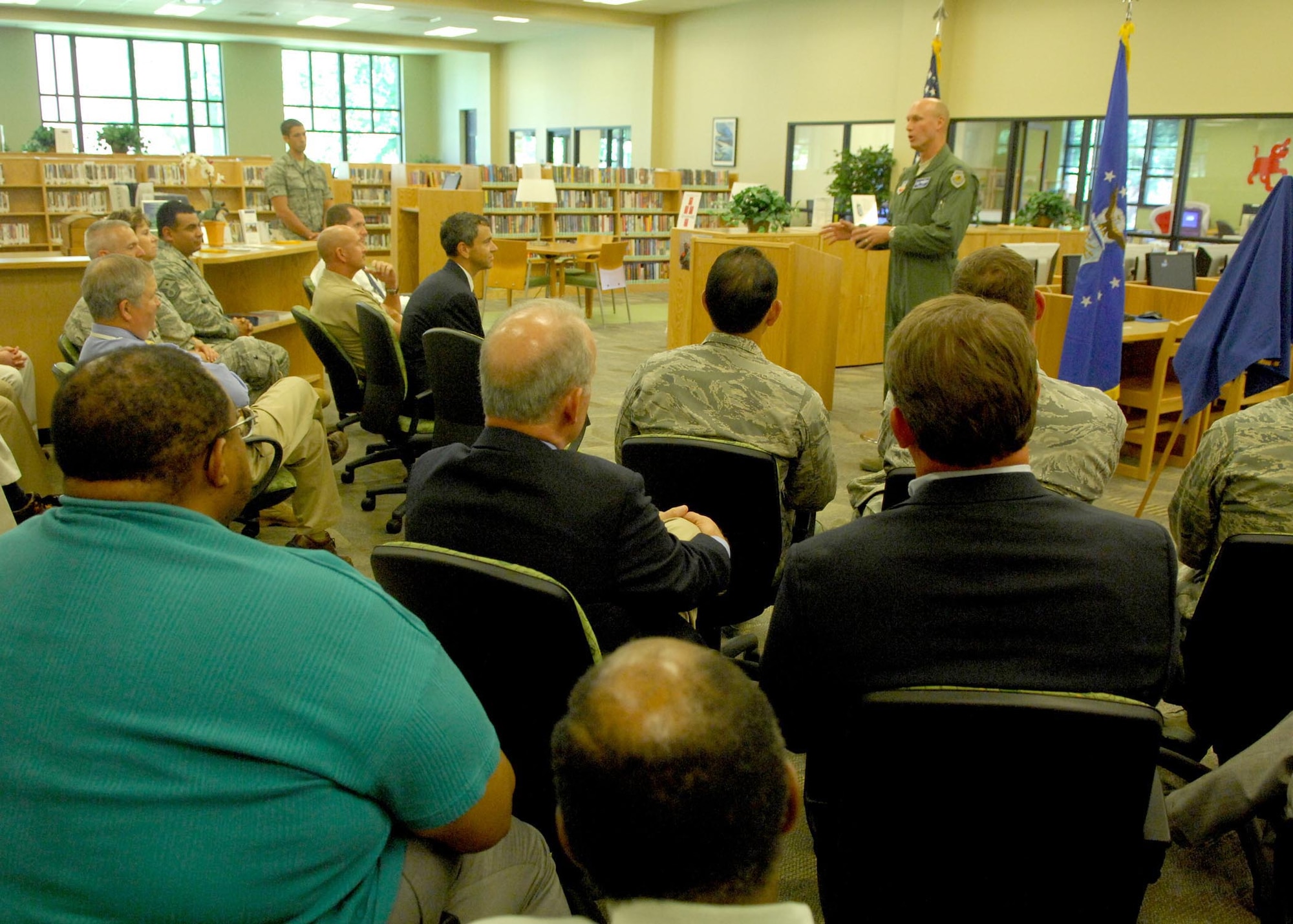 SHAW AIR FORCE BASE, S.C. -- Col. James Post, 20th Fighter Wing commander, accepts the Leadership in Energy and Enviromental Design Silver Certificaton for the McElveen library July 1. Shaw's library was awarded the LEED Silver Certification for its environmental and financial benefits. (U.S. Air Force photo/Airman 1st Class Matthew Davis)