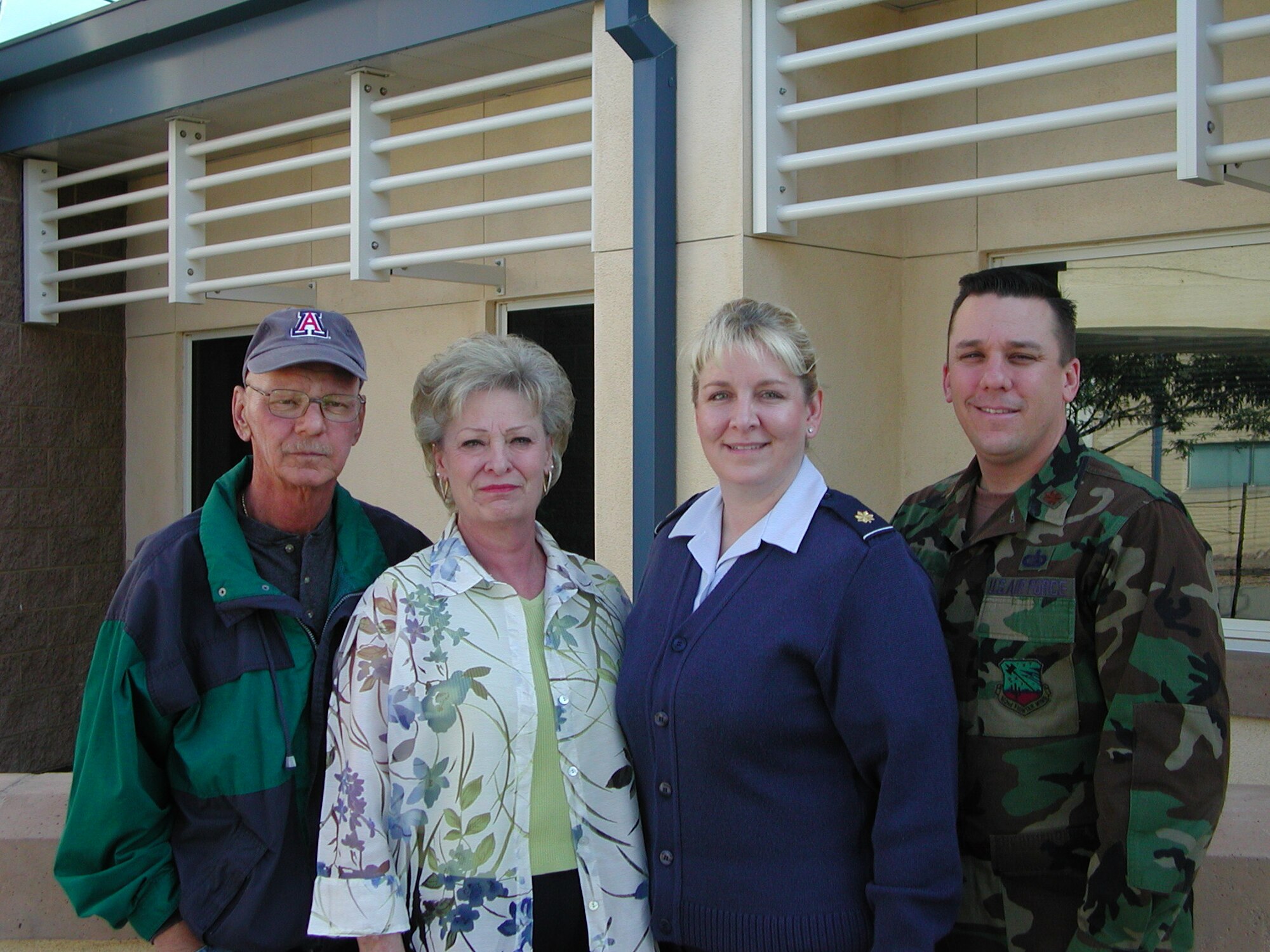 Senior Master Sgt. (Ret.) Jerry Veltman, his wife Chief Master Sgt. (Ret.) Karen Veltman, their daughter Maj. Christine Rhodes and her husband Maj. Bryan Rhodes. Jerry and Karen served a combined 68 years at the 162nd Fighter Wing. Jerry passed away May 31. The entire 162nd family mourned the loss. “I would like to thank everyone for their support for my family and my father,” said daughter Christine. (Air National Guard photo by Staff Sgt. Ashley Karas)