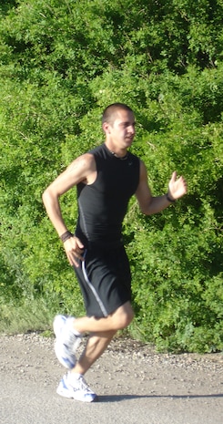 Airman 1st Class Mitchell Fields, 341st Missile Maintenance Squadron, runs in preparation for a 225-mile run from Malmstrom to Billings, Mont., scheduled to start July 6. Airman Fields is running to support the Red Cross' National Disaster Fund. (Courtesy photo)
