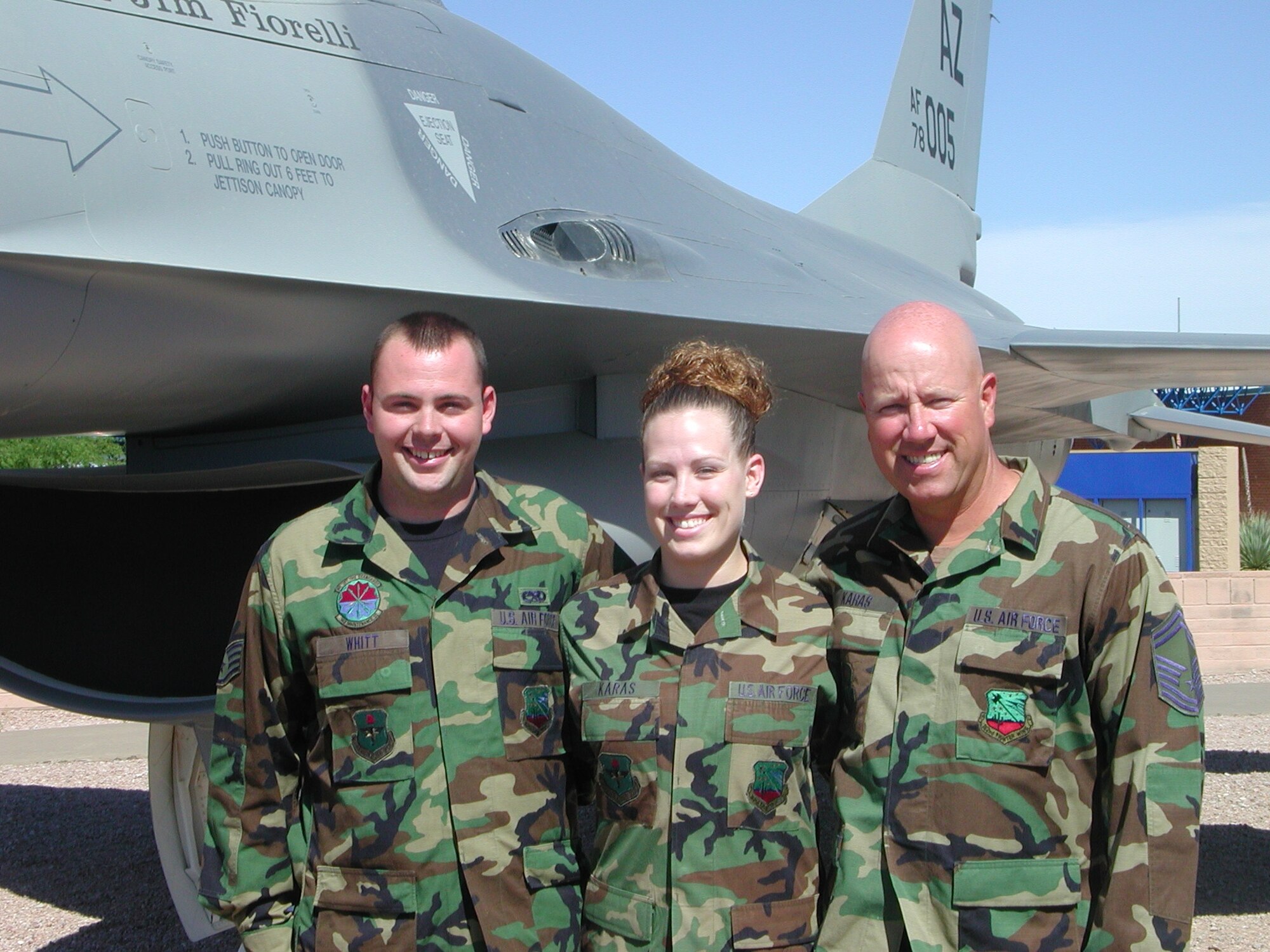 Staff Sgt. Michael Whitt, Staff Sgt. Ashley Karas and Senior Master Sgt. Brian Karas. Ashley and her stepbrother, Michael, joined to follow in their father’s footsteps.