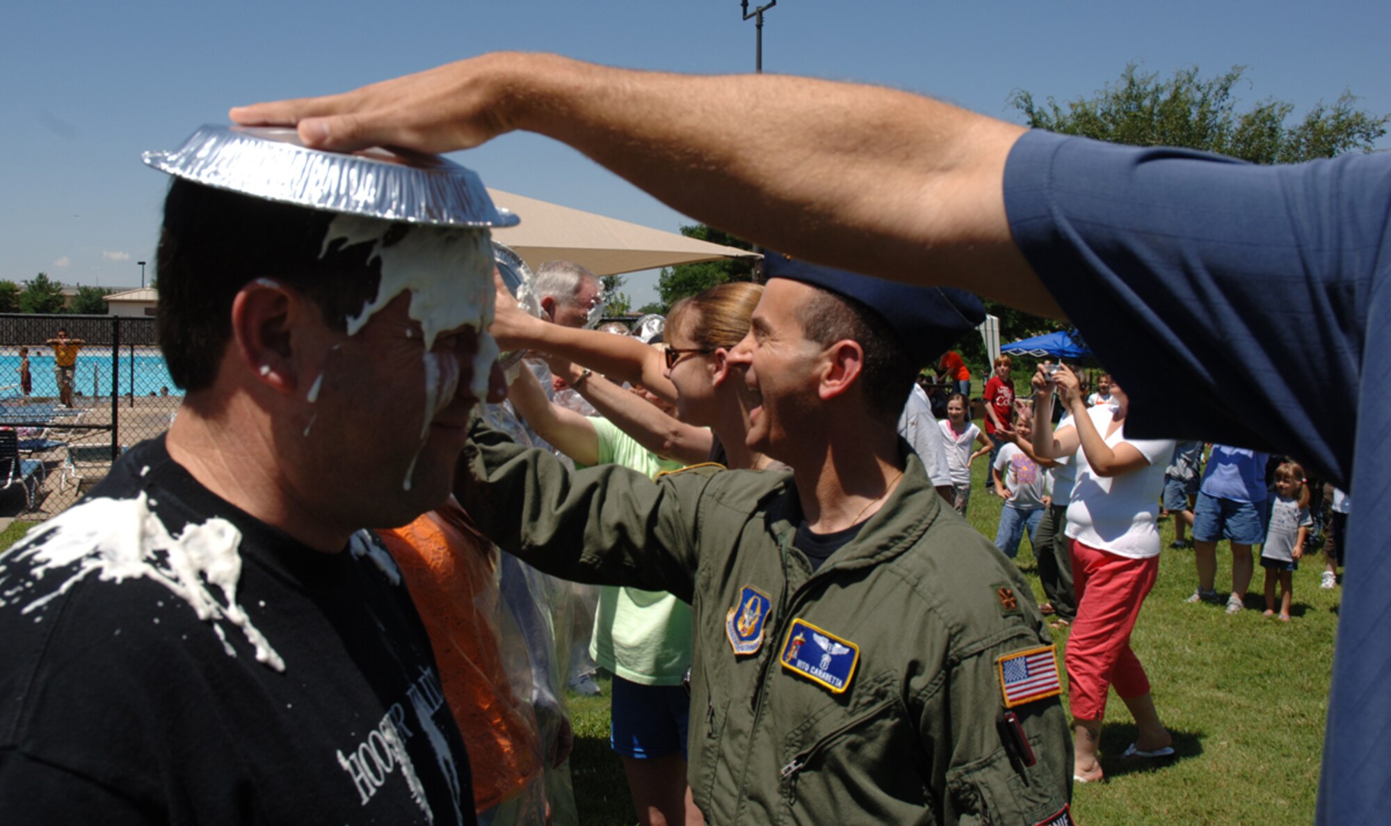 Col. Thomas "Randy" Foster (left), 931st Air Refueling Group Deputy Commander, was among those chosen to get a pie in the face as part of a fundraiser during the Group's Family Day Picnic in 2007.  Volunteers are needed to support this year's picnic, scheduled for the September Unit Training Assembly. Contact Tech. Sgt. Shannan Hughes at 316-759-6082 for more information. (U.S. Air Force photo/Tech. Sgt. Jason Schaap)