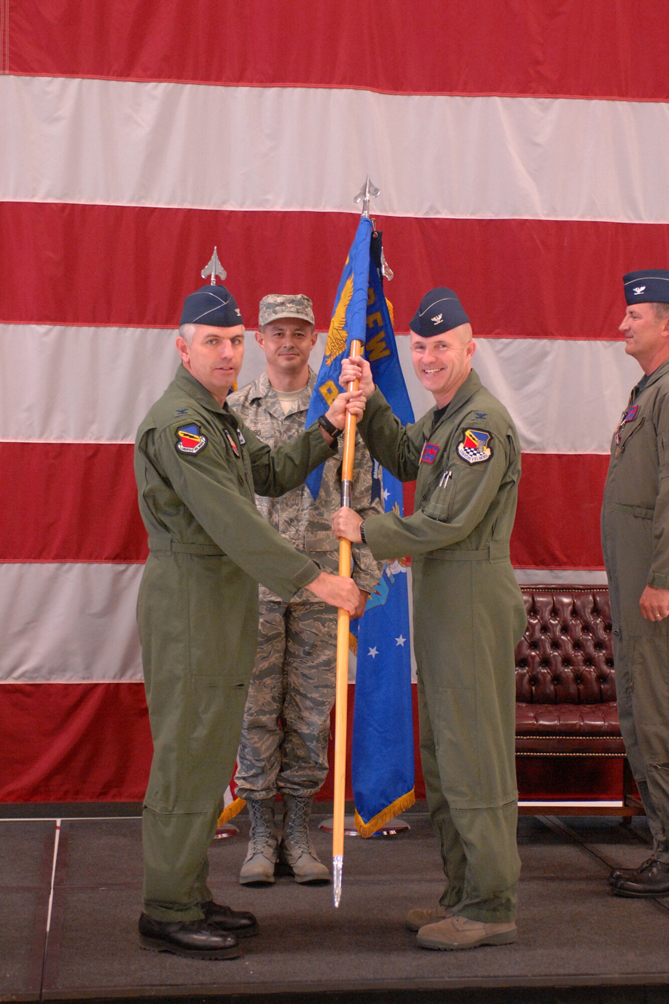 Col. Jeffrey Snell (right) accepts command of the 388th Range Squadron in a ceremony here June 19. The colonel will direct Department of Defense operations on the 2.3 million-acre Utah Test and Training Range and manage approximately 100 personnel.  The 388th Fighter Wing Commander, Col. Scott Dennis (left),  presided over the unit's change of command. (U.S. Air Force photo by Alex Lloyd)
