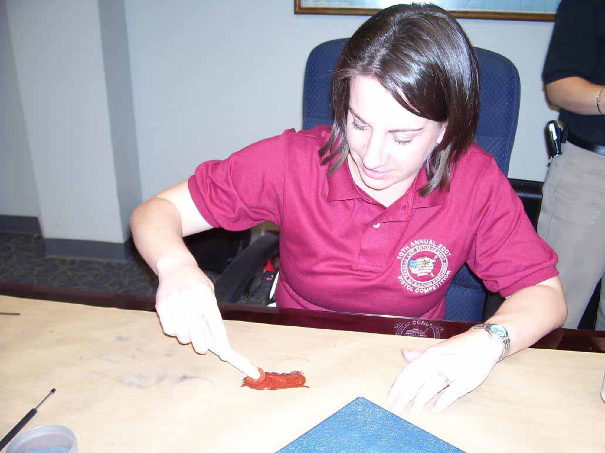 Special Agent Amber Nichols works on moldings.  The Tinker Office of Special Investigations member was recently named Reserve Officer Agent of the Year for Region One.  (Courtesy photo)