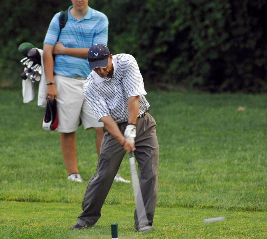 Senior Master Sgt. Kirk Kessler drives the ball down range during the 2nd Annual AT&T National Golf Tournament July 2 at the Congressional Country Club in Bethesda, Md. The Tiger Woods Foundation selected Sergeant Kessler to play in the tournament. Sergeant Kessler is assigned to the 316th Civil Engineer Squadron from Andrews Air Force Base, Md. (U.S. Air Force photo/Senior Airman Steven R. Doty) 
