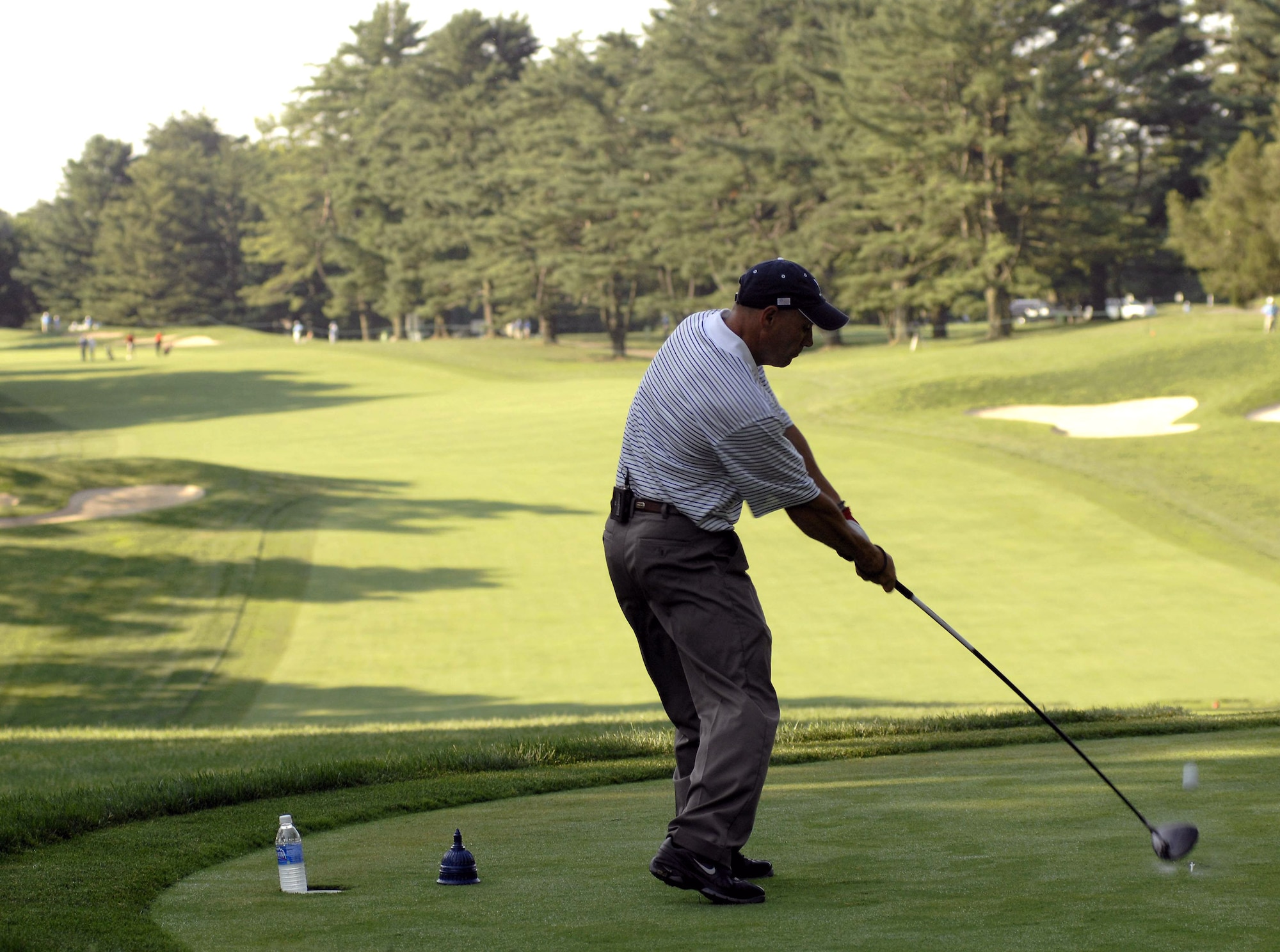 Senior Master Sgt. Kirk Kessler tees off during the 2nd Annual AT&T National Golf Tournament July 2 at the Congressional Country Club in Bethesda, Md. The Tiger Woods Foundation selected Sergeant Kessler to play in the tournament. Sergeant Kessler is assigned to the 316th Civil Engineer Squadron from Andrews Air Force Base, Md. (U.S. Air Force photo/Senior Airman Steven R. Doty) 

