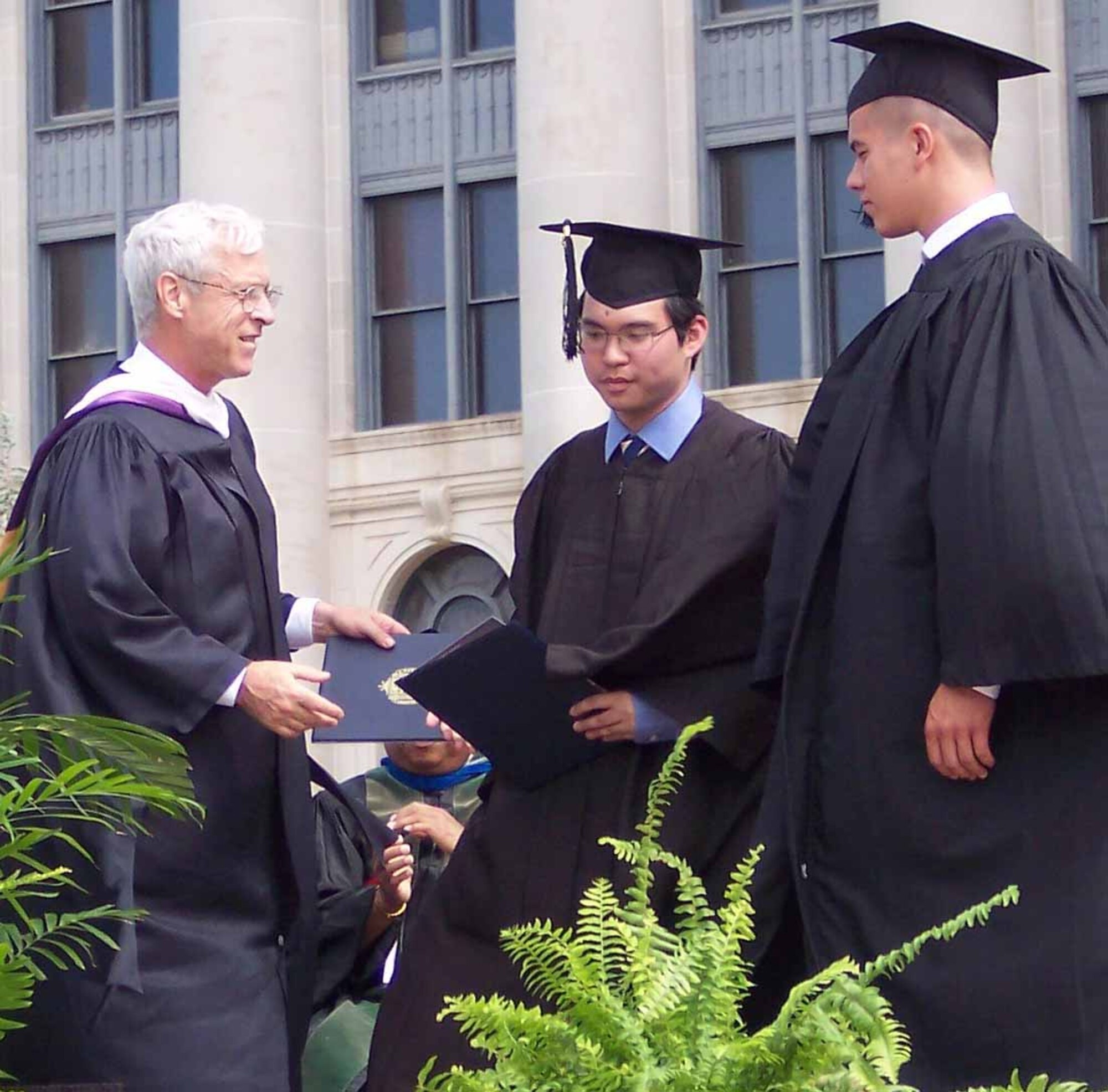 David Hoang, center, received an appointment to the U.S. Naval Academy and started his Plebe Summer Tuesday.  He is a recent graduate of the Oklahoma School of Science and Mathematics in Oklahoma City.  (Courtesy photo)