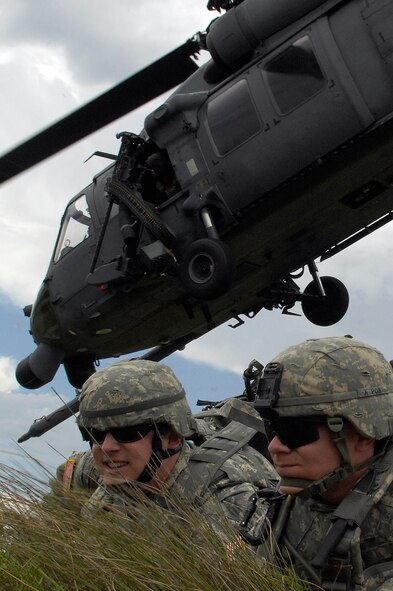 U.S. Army soldiers from the 1st Stryker Brigade Combat Team, 25th infantry Division dismount a U.S. Air Force HH-60G Pave Hawk helicopter during combat exercise Atlantic Strike VII, June 18, 2008 at Avon Park Air Ground Training Complex, Avon Park, Florida. Atlantic Strike is a joint forces training event involving Joint Terminal Attack Controllers from the U.S. Army, Air Force and Marines  and is held semi-annually at Avon Park Air Ground training Complex, Avon Park, FL.
(U.S. Air Force photo by Staff Sgt. Stephen J. Otero)