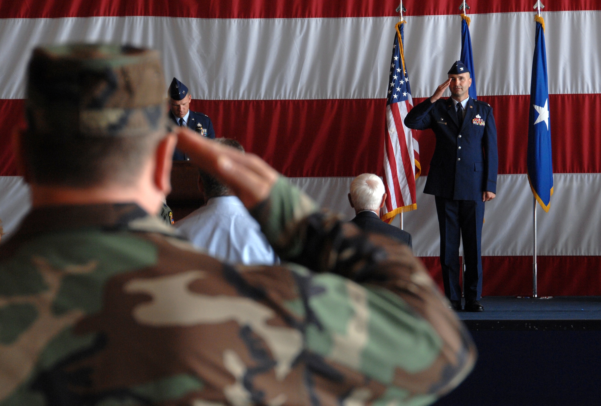 Col. Terry A. Parsons, 55th Maintenance Group commander, returns a salute to the formation at the June 27 change of command ceremony here. (U.S. Air Force Photo/Josh Plueger)