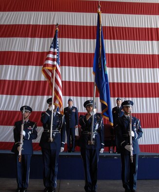 The official party including Brig. Gen. Jim Jones, 55th Wing commander, and Col. Terry A. Parsons, 55th Maintenance Group commander, prepare for the National Anthem. The 55th MXG has operational control of three squadrons, providing maintenance to 31 aircraft here. (U.S. Air Force Photo/Josh Plueger)