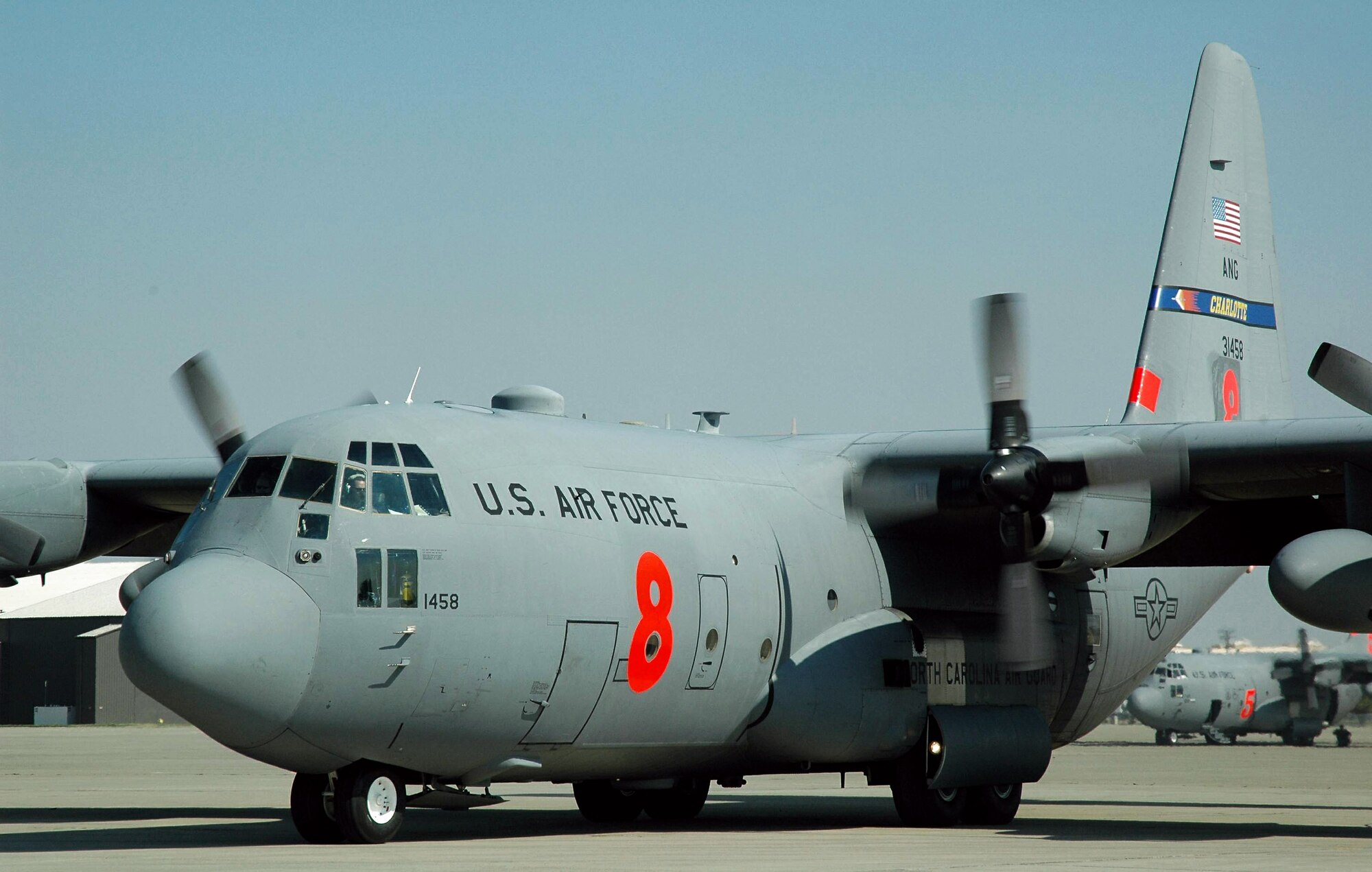 A C-130H Hercules assigned with North Carolina's Air National Guard 145th Airlift Wing taxies down the ramp July 1 at McClellan Airfield in Sacramento, Calif. The aircraft just finished a successful mission of dropping fire retardant on the Piute fire burning in California's Sequoia National Forest. (U.S. Air Force photo/Staff Sgt. Luke Johnson)
