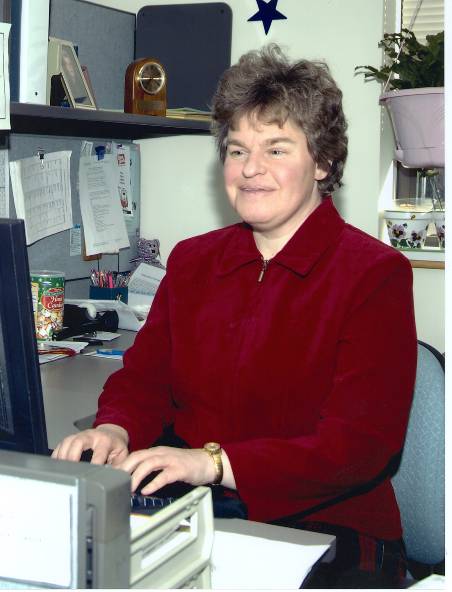 HANSCOM AFB, Mass. -- Joanne Jordan, lead information manager for the 950th Electronic Systems Group, works at her computer.  Ms. Jordan, who has been blind since birth, recently won the Air Force Materiel Command-level Outstanding Department of Defense Employee with a Disability Award for 2007. (U.S. Air Force photo.)
