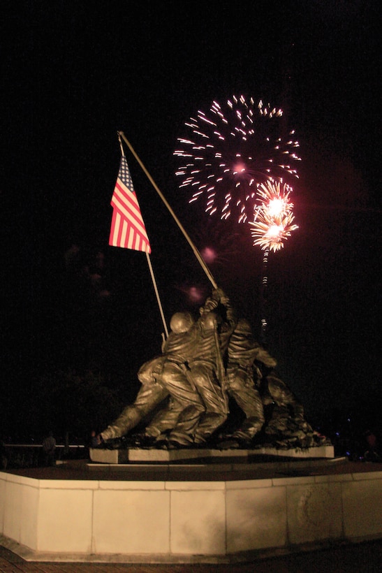 Fireworks exploding provide the perfect lighting for the Depot’s Iwo Jima monument during the Fourth of July celebration at Parris Island.