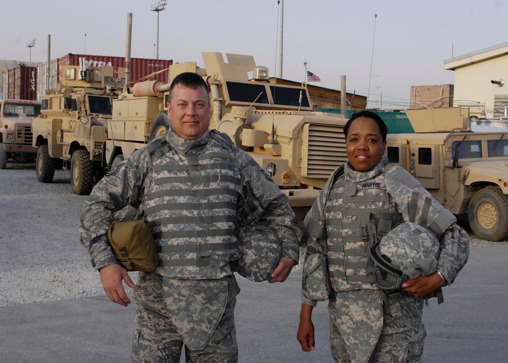 BAGRAM AIR FIELD, Afghanistan - Tech Sgt. Daren Dykes (left) and Master Sgt. Loretta Martin are Walthall County, Miss., natives. Sergeant Dykes is a manpower analyst deployed from the 325th Fighter Wing, Tyndall Air Force Base, Fla., and Sergeant Martin is deployed from the 316th Wing, Andrews Air Force Base, Md, where she is the Equal Opportunity manager. (U.S. Air Force photo by Master Sgt. Demetrius Lester)