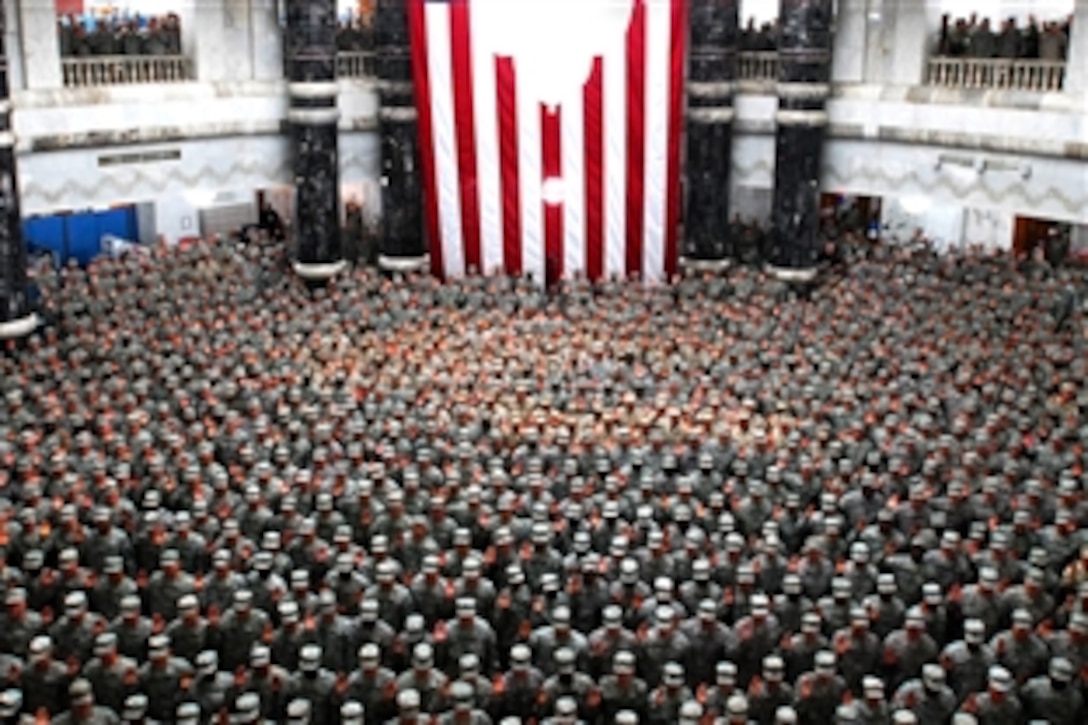 More than 1,200 U.S. troops re-enlist in Baghdad, July 4, 2008, during a ceremony in the Al Faw Palace rotunda led by Multinational Force-Iraq Commander Army Gen. David Petraeus. 
