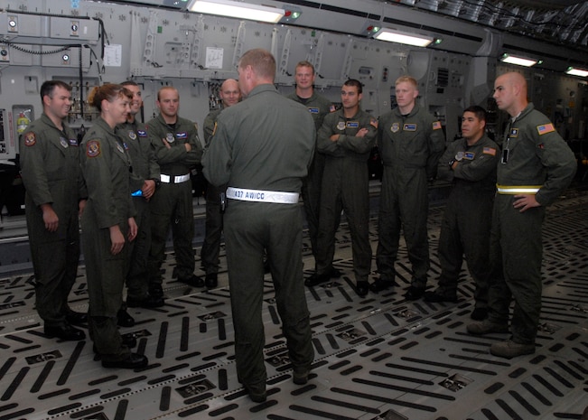 Col. John "Red" Millander welcomes home the Charleston AFB C-17 crew that flew to Colombia and returned July 3. The crew assisted in the release of three Americans being held as prisoners by the Revolutionary Armed Forces in Colombia for five years. Colonel Millander is the 437th Airlift Wing commander. (U.S. Air Force photo/Airman 1st Class Cynthia Spalding)