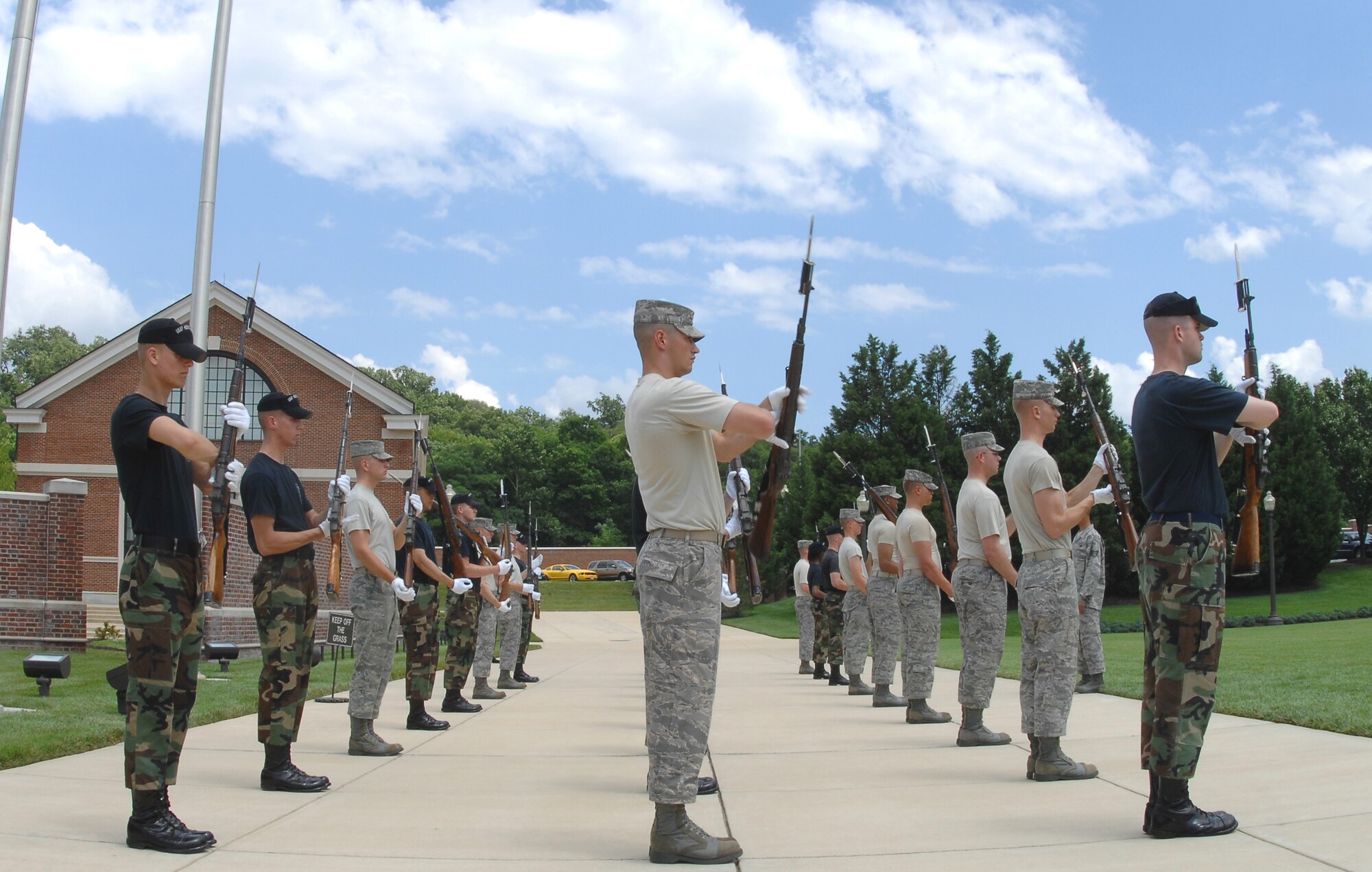 U.S. Air Force Honor Guard members train for the upcoming 90th anniversary birthday ceremony of Bolling July 1 at the U.S. Air Force Ceremonial Lawn. A ceremonial tattoo is 7 p.m. July 25. Bolling was established July 1, 1918, and named in honor of Col. Raynal C. Bolling whom was killed in World War I. The land was then scouted by William C. Ockerand and Brig. Gen. William "Billy" Mitchell to be the only air field in the nation's capital. (U.S Air Force photo by Senior Airman Alexandre Montes)