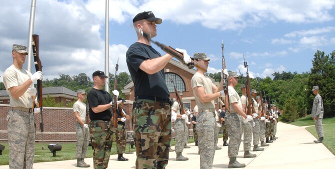 U.S. Air Force Honor Guard members train for the upcoming 90th anniversary birthday ceremony of Bolling July 1 at the U.S. Air Force Ceremonial Lawn. A ceremonial tattoo is 7 p.m. July 25. Bolling was established July 1, 1918, and named in honor of Col. Raynal C. Bolling whom was killed in World War I. The land was then scouted by William C. Ockerand and Brig. Gen. William "Billy" Mitchell to be the only air field in the nation's capital. (U.S Air Force photo by Senior Airman Alexandre Montes)