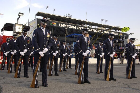 The U.S. Air Force Honor Guard Drill Team stands ready just before a performance July 4 at the Daytona International Speedway in Daytona Beach, Fla. The drill team is the traveling component of the Honor Guard and tours worldwide representing all Airmen while showcasing Air Force precision. (U.S. Air Force photo by Airman 1st Class Sean Adams)