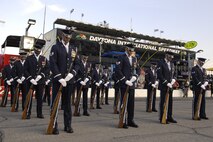 The U.S. Air Force Honor Guard Drill Team stands ready just before a performance July 4 at the Daytona International Speedway in Daytona Beach, Fla. The drill team is the traveling component of the Honor Guard and tours worldwide representing all Airmen while showcasing Air Force precision. (U.S. Air Force photo by Airman 1st Class Sean Adams)