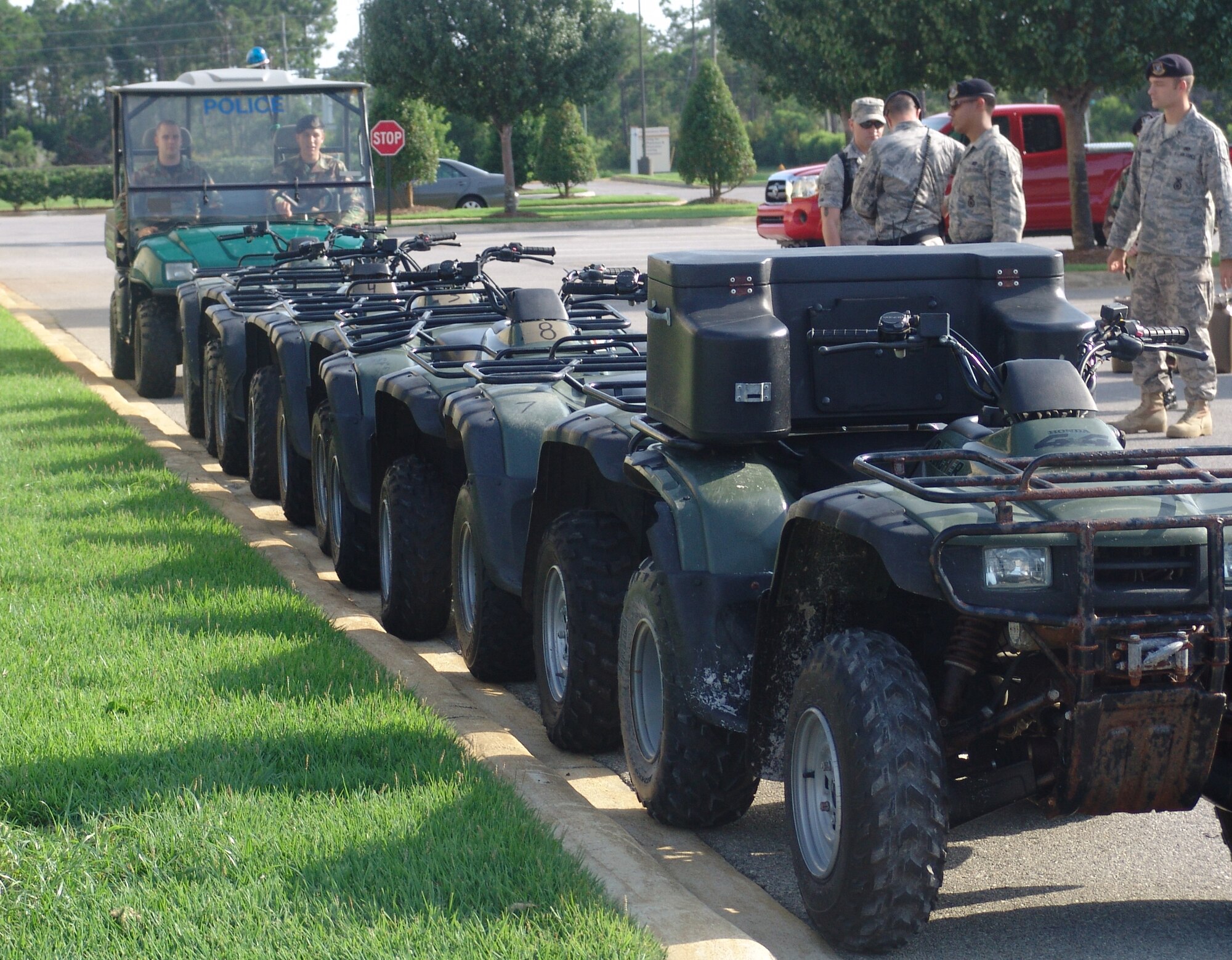 96th Security Forces Squadron members line up a row of all-terrain vehicles July 6 in preparation for a search for a man who went missing from the Crystal Bay Senior Living community in Sandestin.