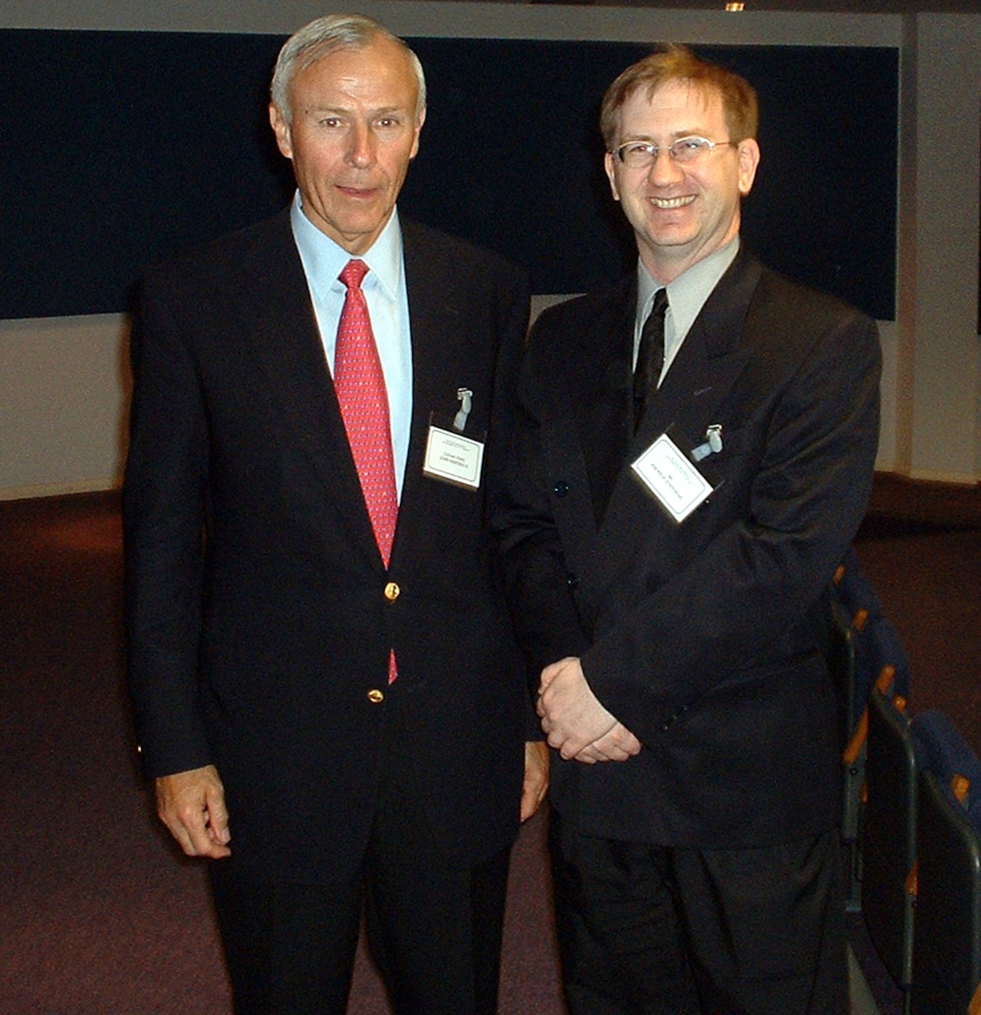 Andrew J. Stephens, the Air Force District of Washington and 11th Wing historian, poses for a photo with retired Air Force Col. John Warden III, president of Venturist, Inc. Mr. Stephens and Colonel Wardern were both speakers at the Air Power and Strategy: Challenges for the 21st Century Conference in Shrivenham, England (London area) from June 12-13. Mr. Stephens mounted the podium with his paper, "Stairway to Heaven: Building Air and Space Power Awareness through Public and Media Outreach," a reflection of his vision for effective public affairs strategies in air forces worldwide. (Photo courtesy of Andy Stephens)