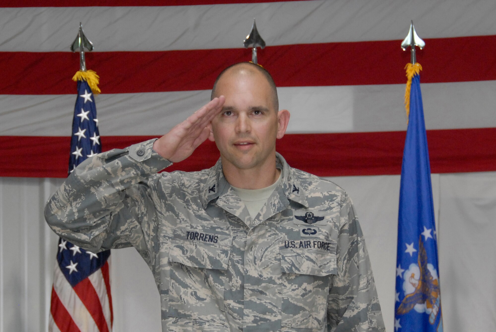 SOUTHWEST ASIA -- Colonel Cameron Torrens, 386th Air Expeditionary Wing Commander, renders his first salute to his Airmen after assuming command of the 386th AEW from Col. Robert Swisher during a change of command ceremony here July 6, 2008. (U.S. Air Force photo/Staff Sgt. Patrick Dixon)
