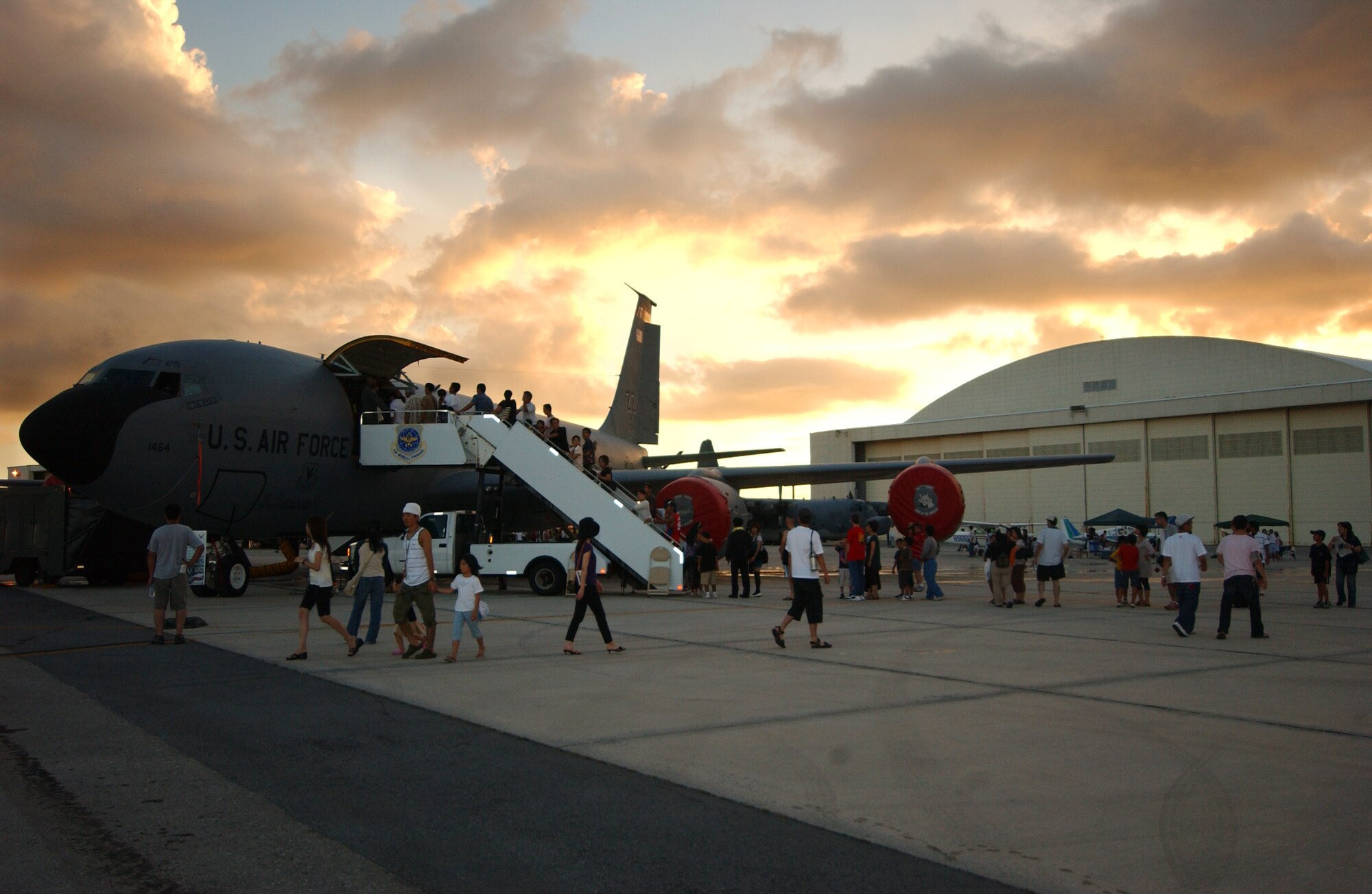 Local nationals get a first glimpse of a KC-135 StratoTanker during AmericaFest, an open house event held July 5 at Kadena Air Base, Japan. AmericaFest featured two dozen aircraft static displays, live entertainment, activities for children and a nightly fireworks show. The two-day event, which was designed to strengthen relations with the base's Okinawan neighbors, drew nearly 66,000 people.
(U.S. Air Force photo/Tech. Sgt. Rey Ramon)