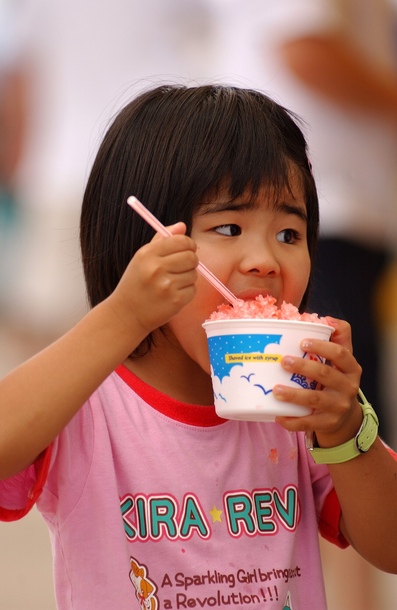 Miho Matsumura, 5, enjoys a refreshement during AmericaFest, an open house event held July 5 at Kadena Air Base, Japan. AmericaFest featured two dozen aircraft static displays, live entertainment, activities for children and a nightly fireworks show. The two-day event, which was designed to strengthen relations with the base's Okinawan neighbors, drew nearly 66,000 people.
(U.S. Air Force photo/Tech. Sgt. Rey Ramon) 