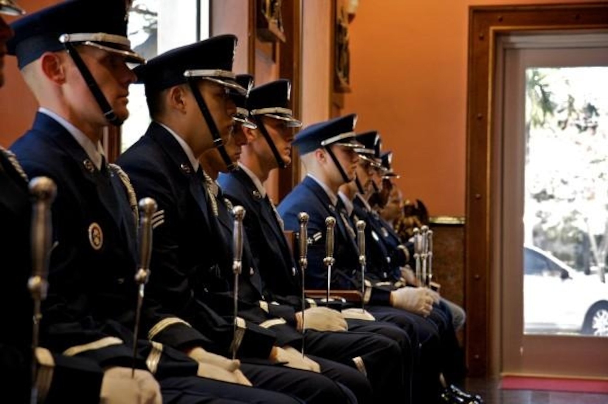 The Team Andersen Honor Guard sits, showcasing their military bearing while waiting at an event. The Team Andersen Honor Guard's primary mission is to provide final military honors to our fallen military members. (Courtesy Photo)