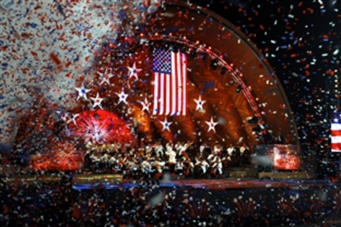 Confetti rains down at the completion of the song "Stars and Stripes Forever" during the 35th Boston Pops Orchestra and Fireworks Spectacular in Boston, July 4, 2008. U.S. sailors assigned to the multi-purpose amphibious assault ship USS Bataan are in Boston participating in the 27th Annual Boston Harborfest 2008, a six-day festival that showcases U.S. colonial and maritime heritage. 