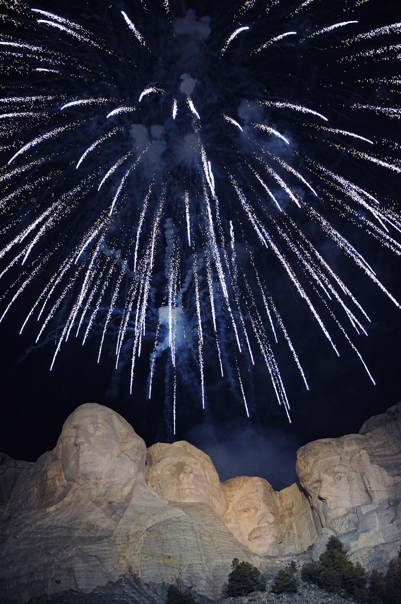 Fireworks detonate above the Mount Rushmore National Memorial, July 3. The firework display served as a finale to the day’s events, which included a performance by the Ellsworth Air Force Base Honor Guard. (U.S. Air Force photo/Senior Airman Marc I. Lane)