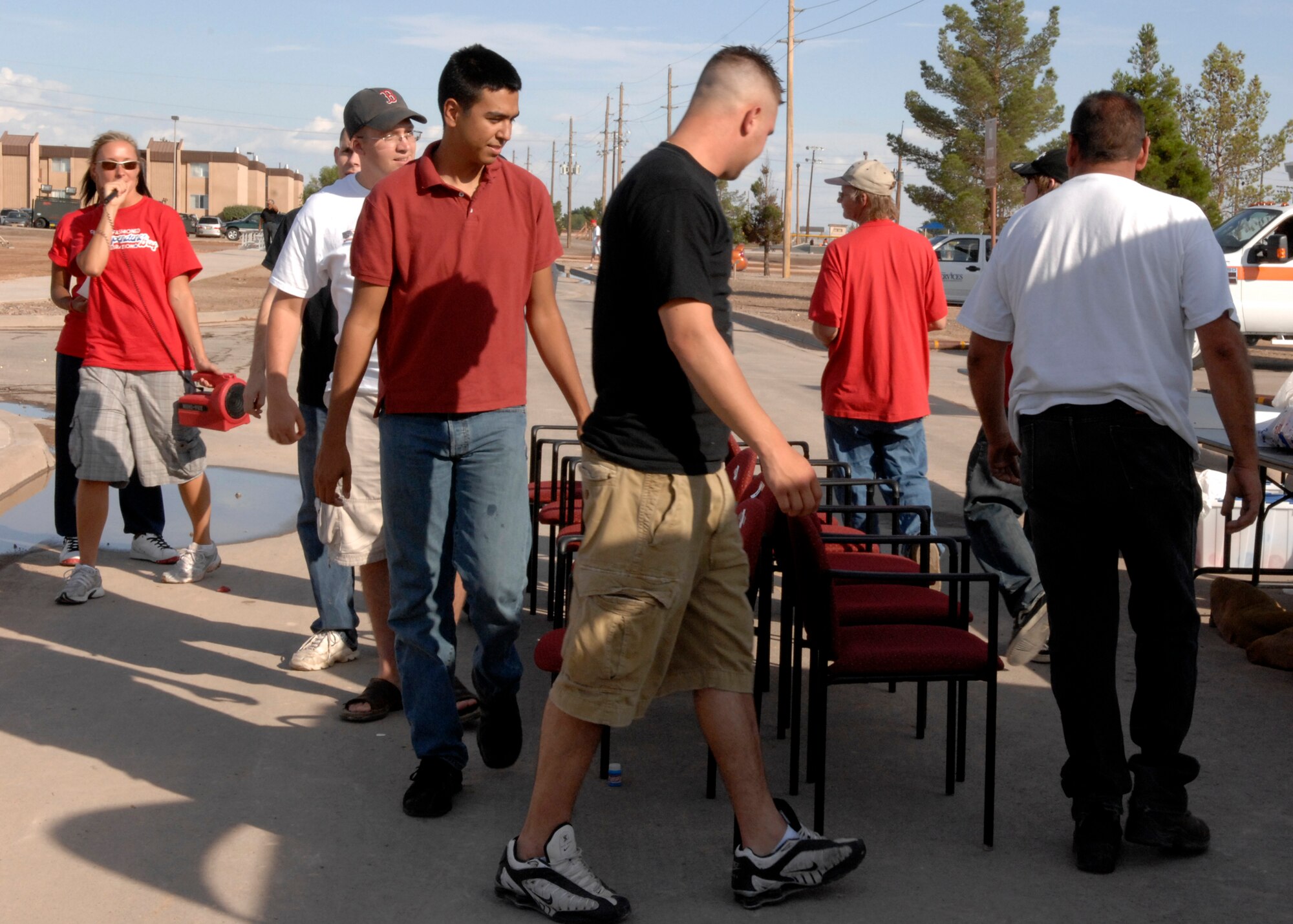 Team Holloman contestants participate in a musical chair scavenger hunt, July 3 at the Old Fashion Independence Day celebration at Holloman Air Force Base, N.M. Other activities included a watermelon eating contest and frozen T-shirt contest. (U.S. Air Force photo/Airman 1st Class Rachel A. Kocin)
