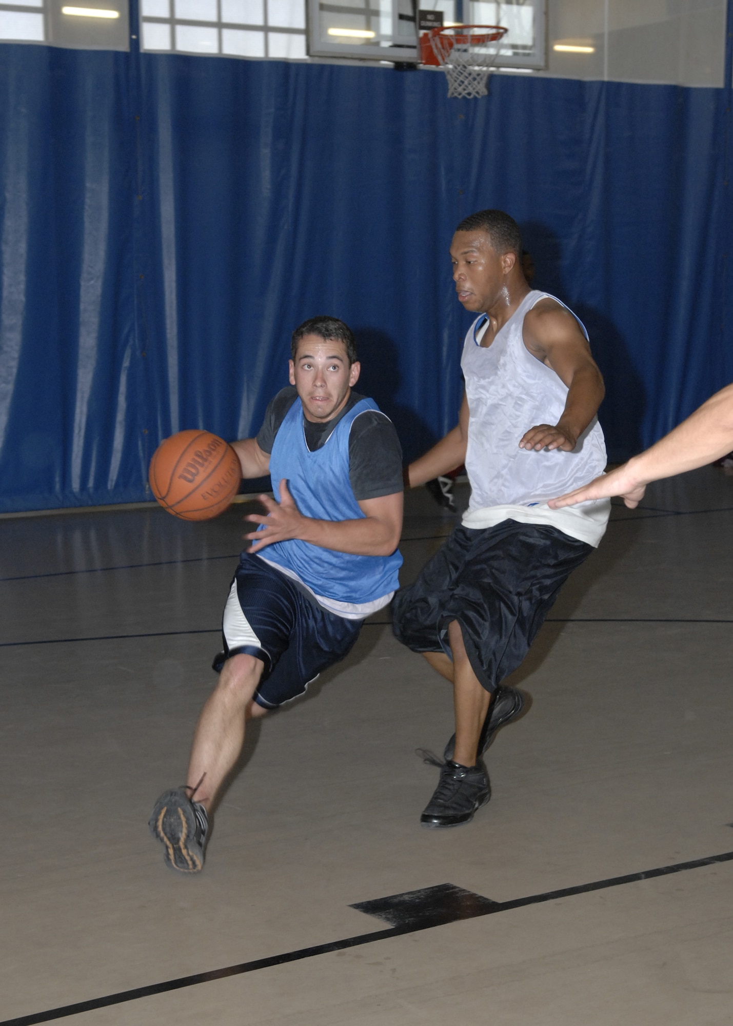 Team Holloman members participate in a basketball tournament, July 3 at the Old Fashion Independence Day celebration at Holloman Air Force Base, N.M. More than 3,000 Team Holloman members attended the celebration. (U.S. Air Force photo/Airman 1st Class Rachel A. Kocin)